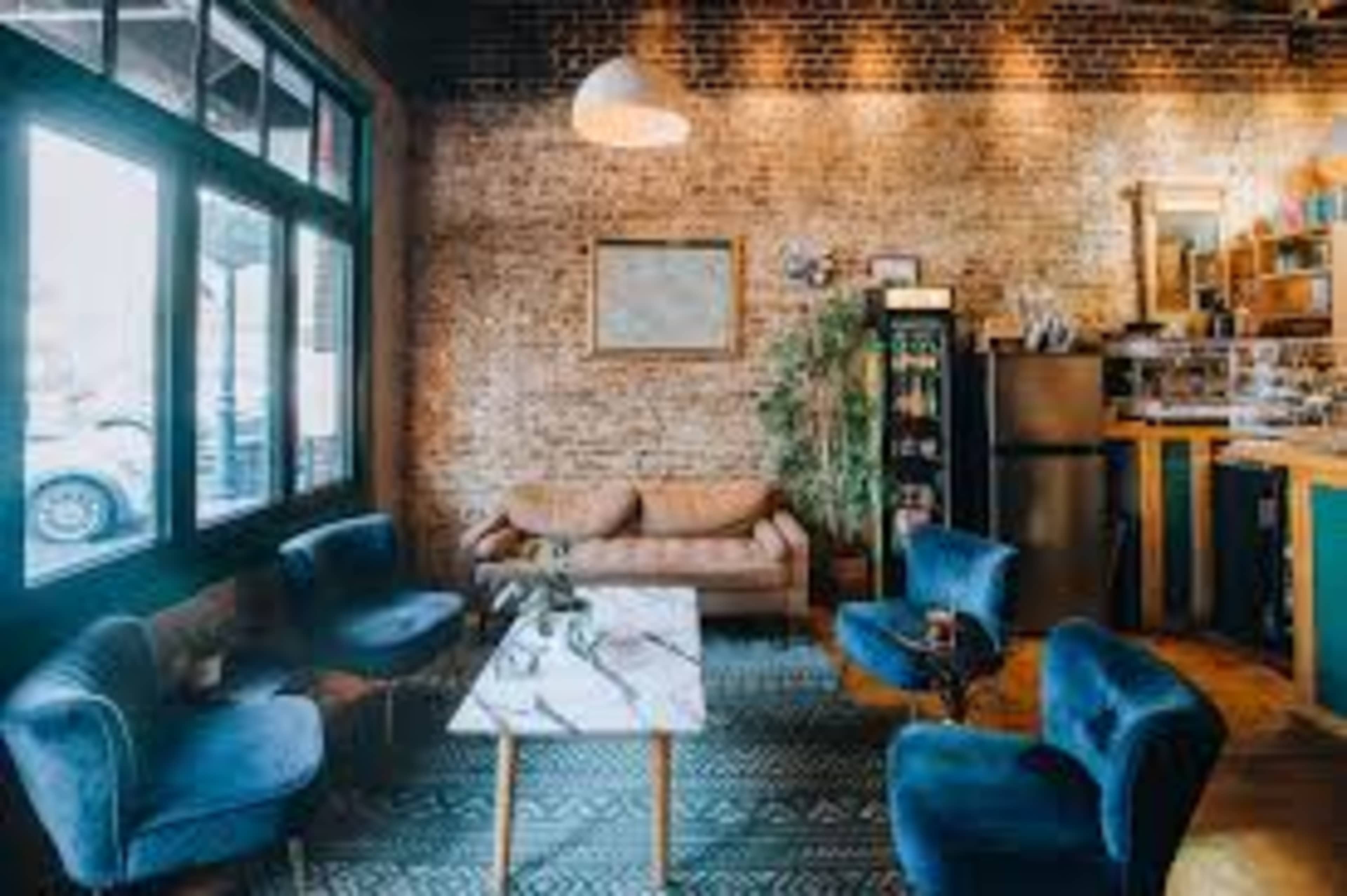 Charming Cafe with Exposed Brick & Natural Light Image in Virginia Village, Denver, CO