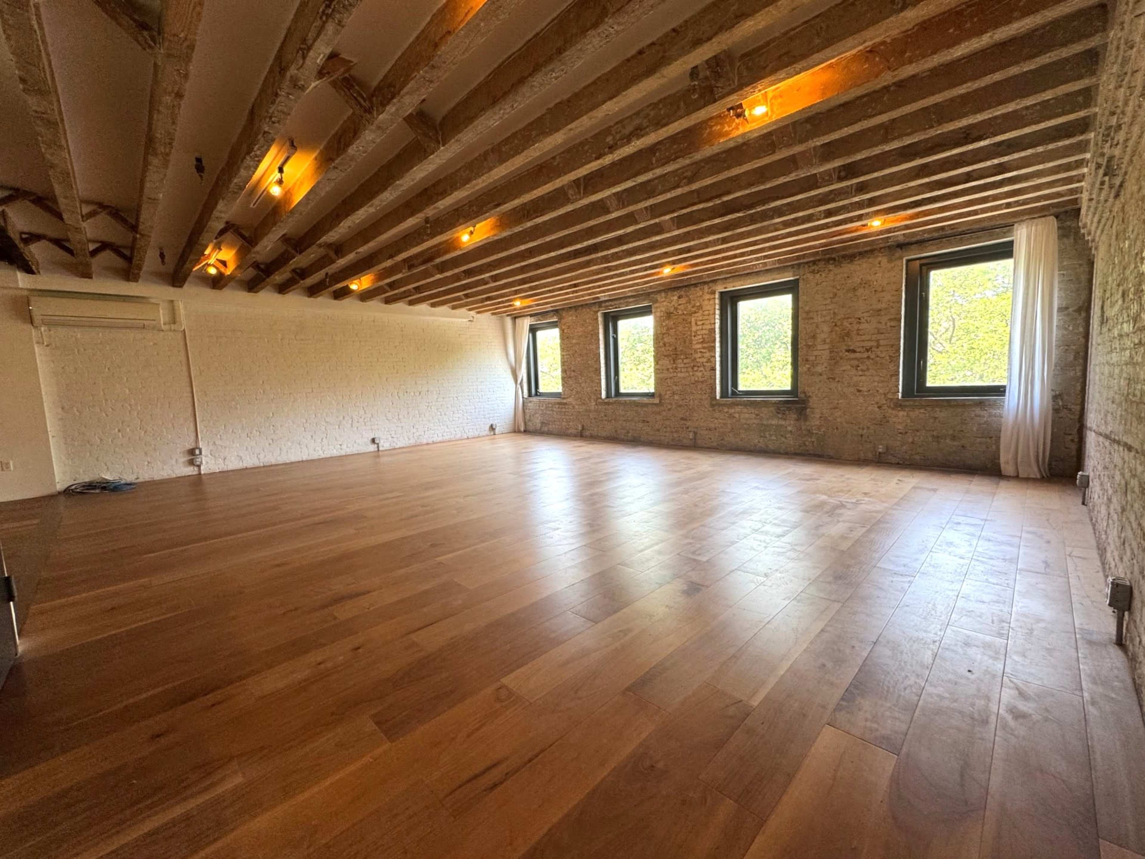 Conveniently-located Studio with Exposed Brick & Park Views in LES Image in Chinatown, New York, NY