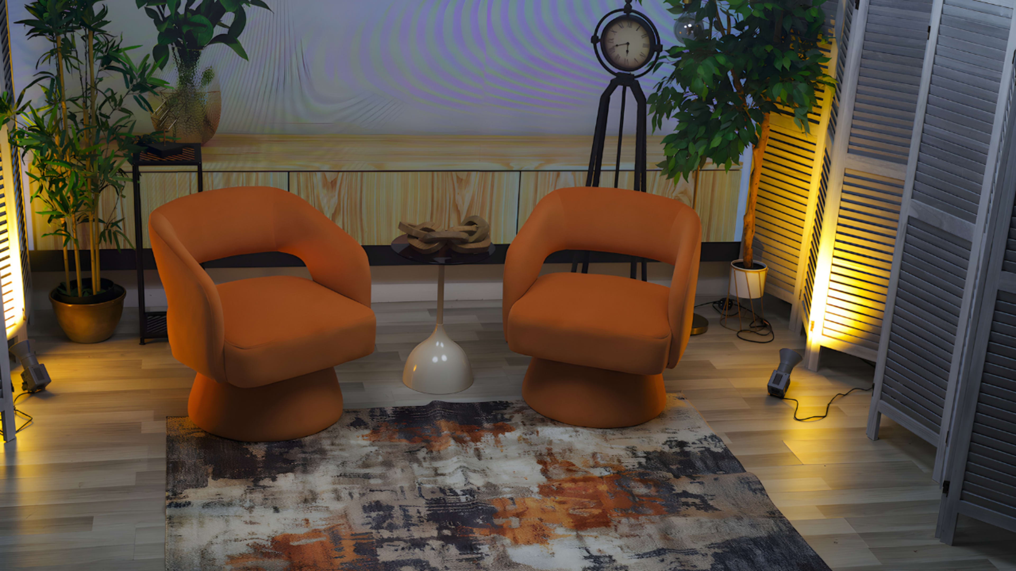 Two orange upholstered chairs are positioned around a small white table in a modern, well-lit interior with decorative plants and a wall clock.