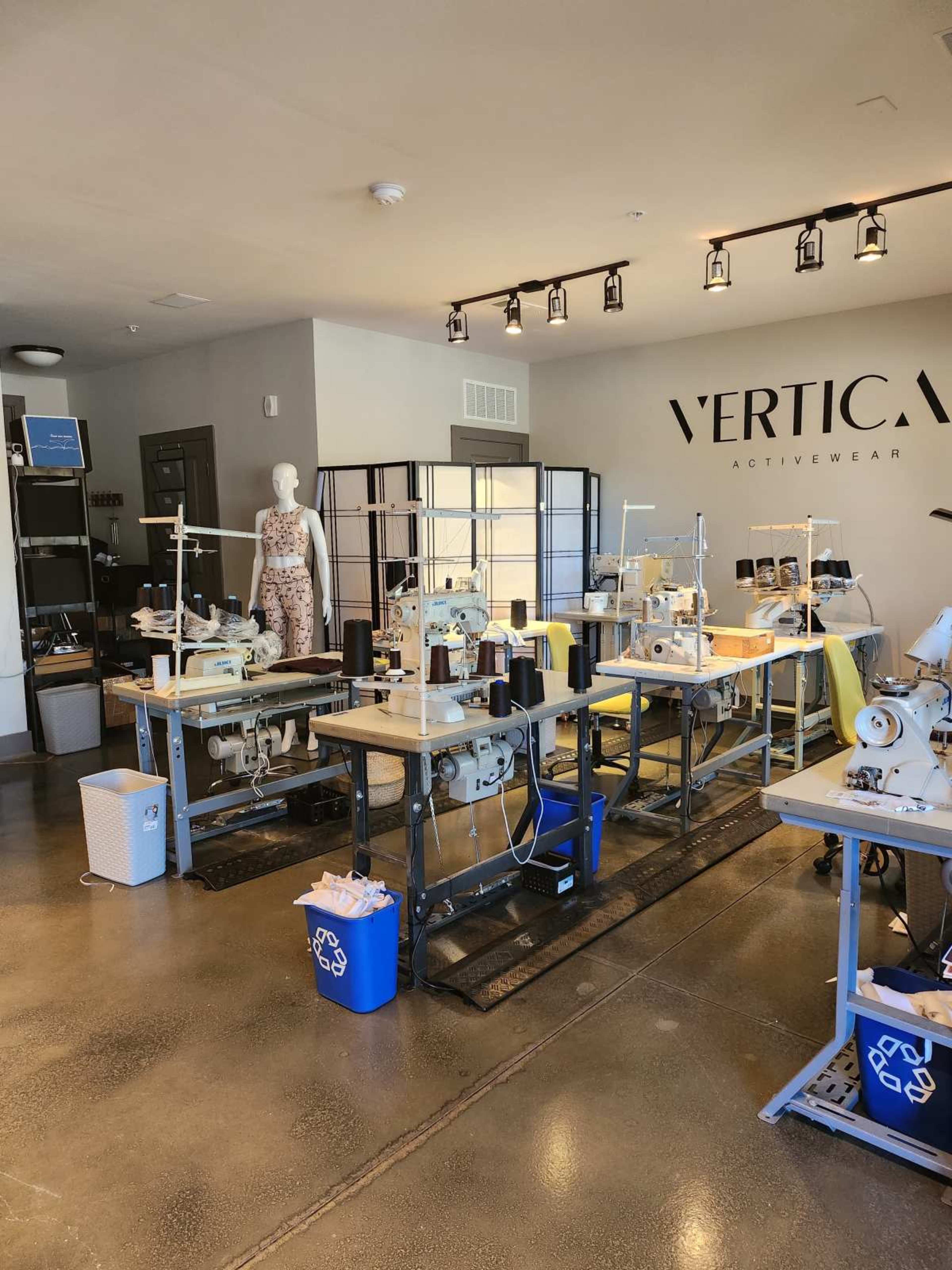 Intimate Sewing Studio with Industrial Machines & Photography Wall Image in Duluth, Duluth, GA