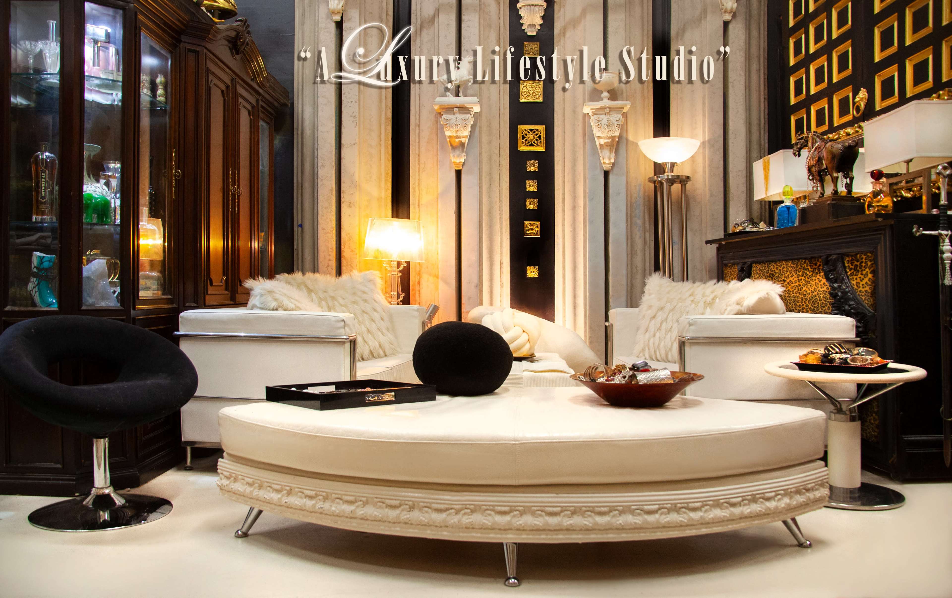 The image depicts a luxurious living space featuring elegant furniture, ornate decorations, and a stylish coffee table, emphasizing a sophisticated ambiance.