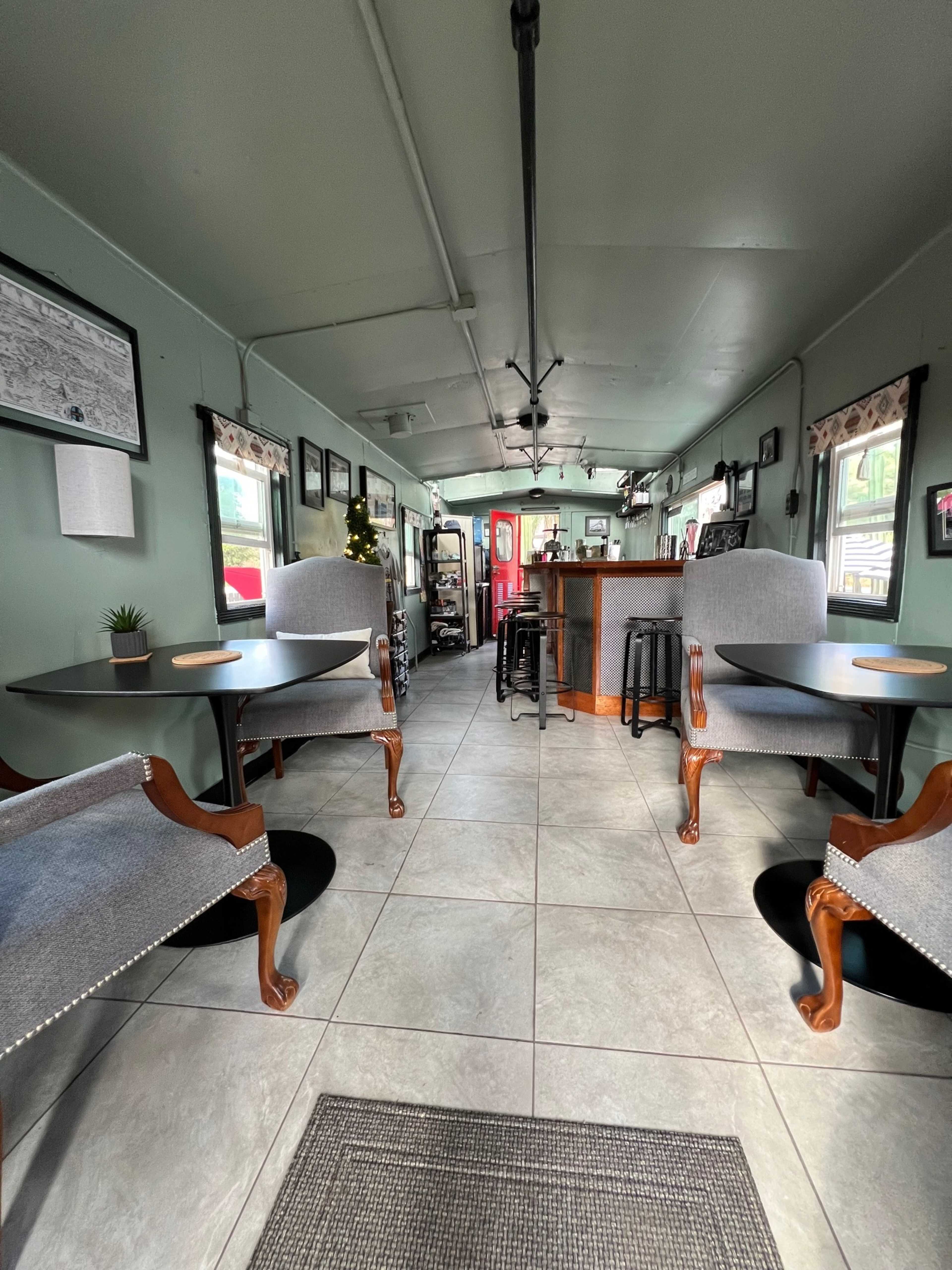 Vintage Train Caboose with Cafe Patio and Fenced Yard Image in , Flinn Springs, CA