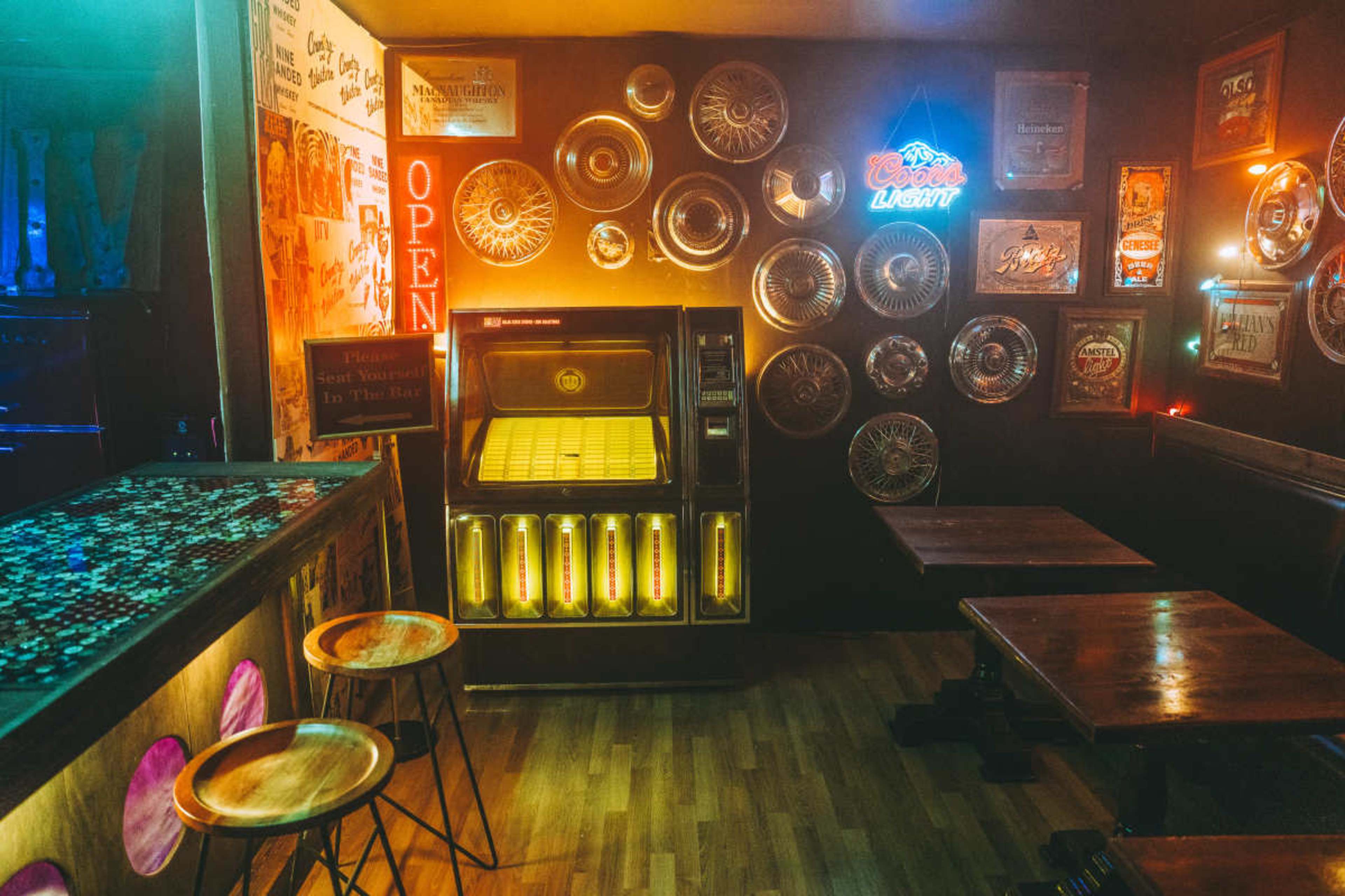 Multi-set  Retro Content studio with 10+ Sets: Dive Bar, Phone Booth, Barn, Stage, Living Room, Hotel, Bedroom, Dining Room, Lounge Holiday Props Image in East Nashville, Nashville, TN