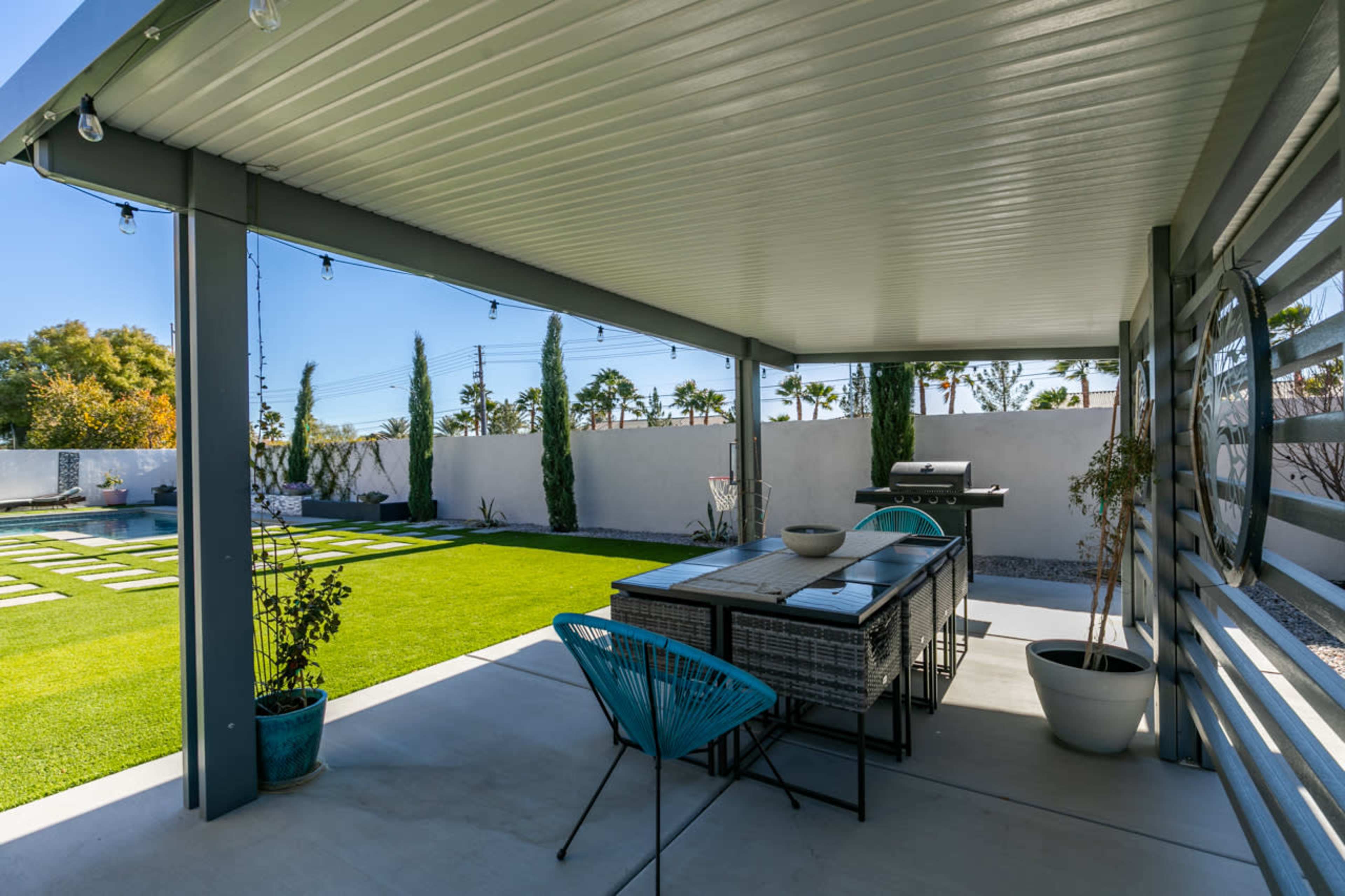 Whimsical Private backyard with pool , patio, fire pit in quiet North West Las Vegas neighborhood. Image in Wyeth Ranch, Las Vegas, NV
