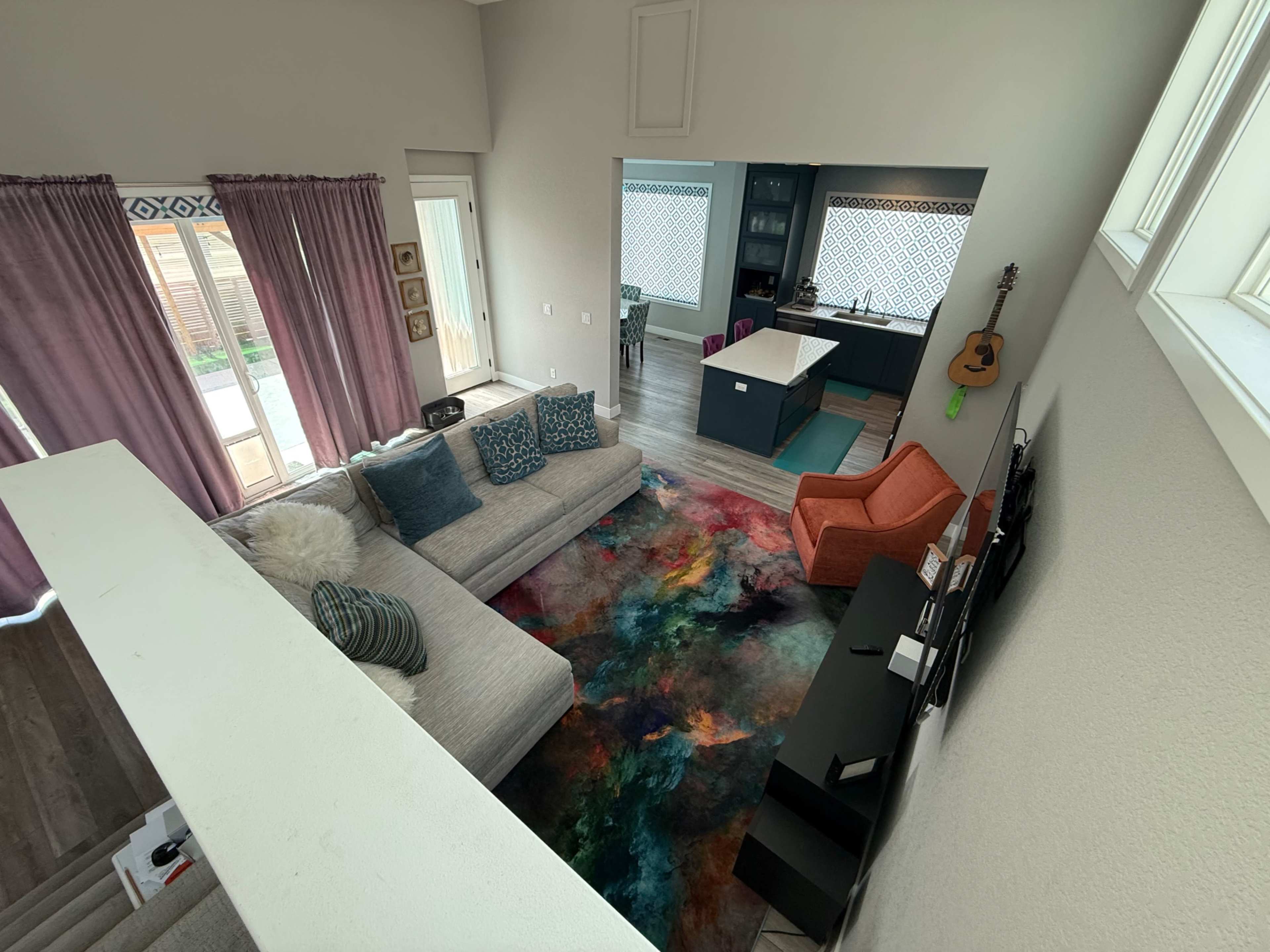 Ultra Modern natural light filled. Rooftop deck with Rocky Mountain View’s. Professional music recording studio. Side yard with gazebo on Astro turf. Image in Twin Lakes, Denver, CO