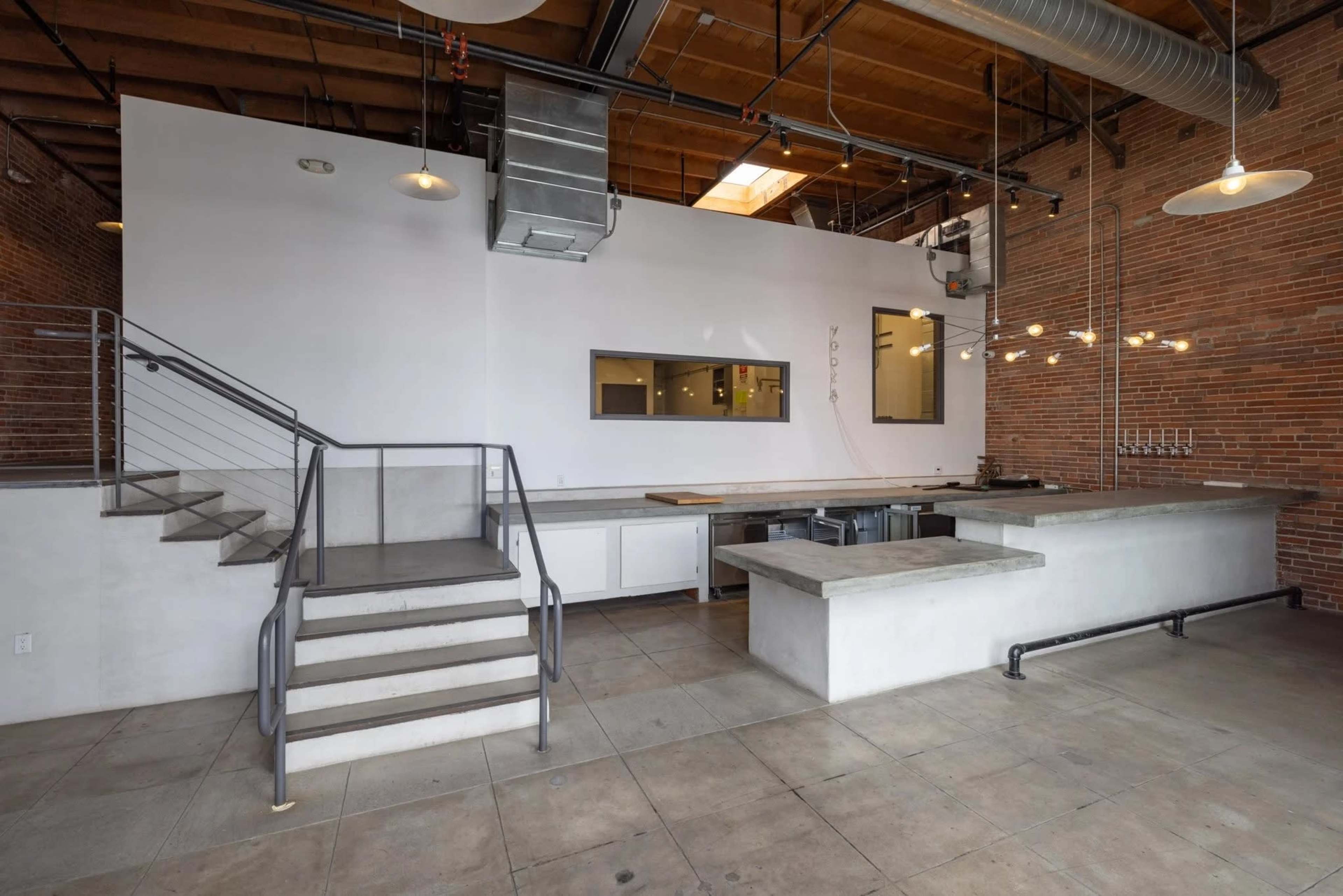 Arts District Bright Modern Event Space with Cafe/Bar | Gated Parking | Rollup Door Access Image in Central LA, Los Angeles, CA