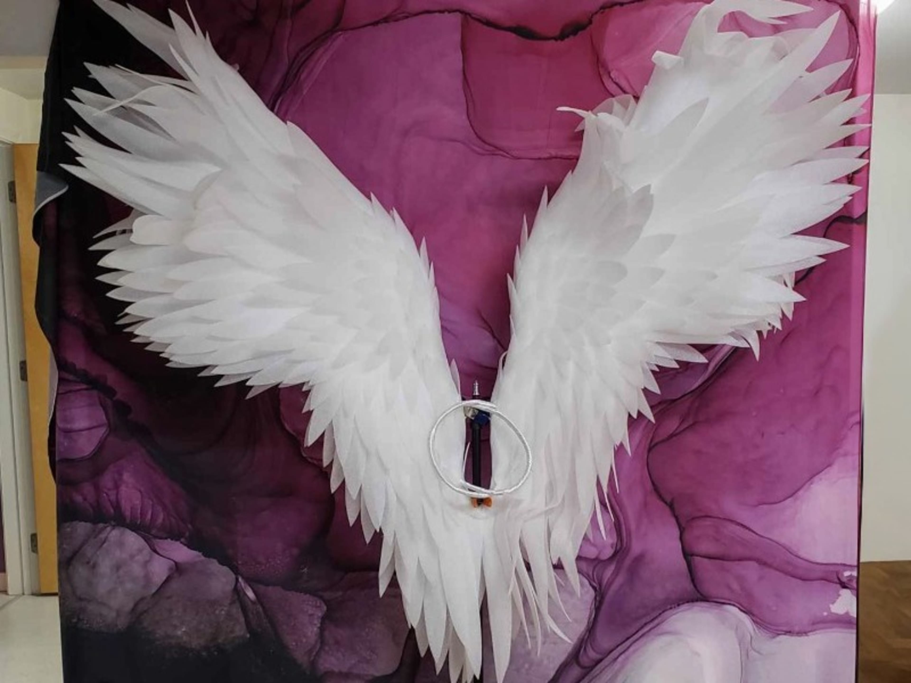 Large white angel wings