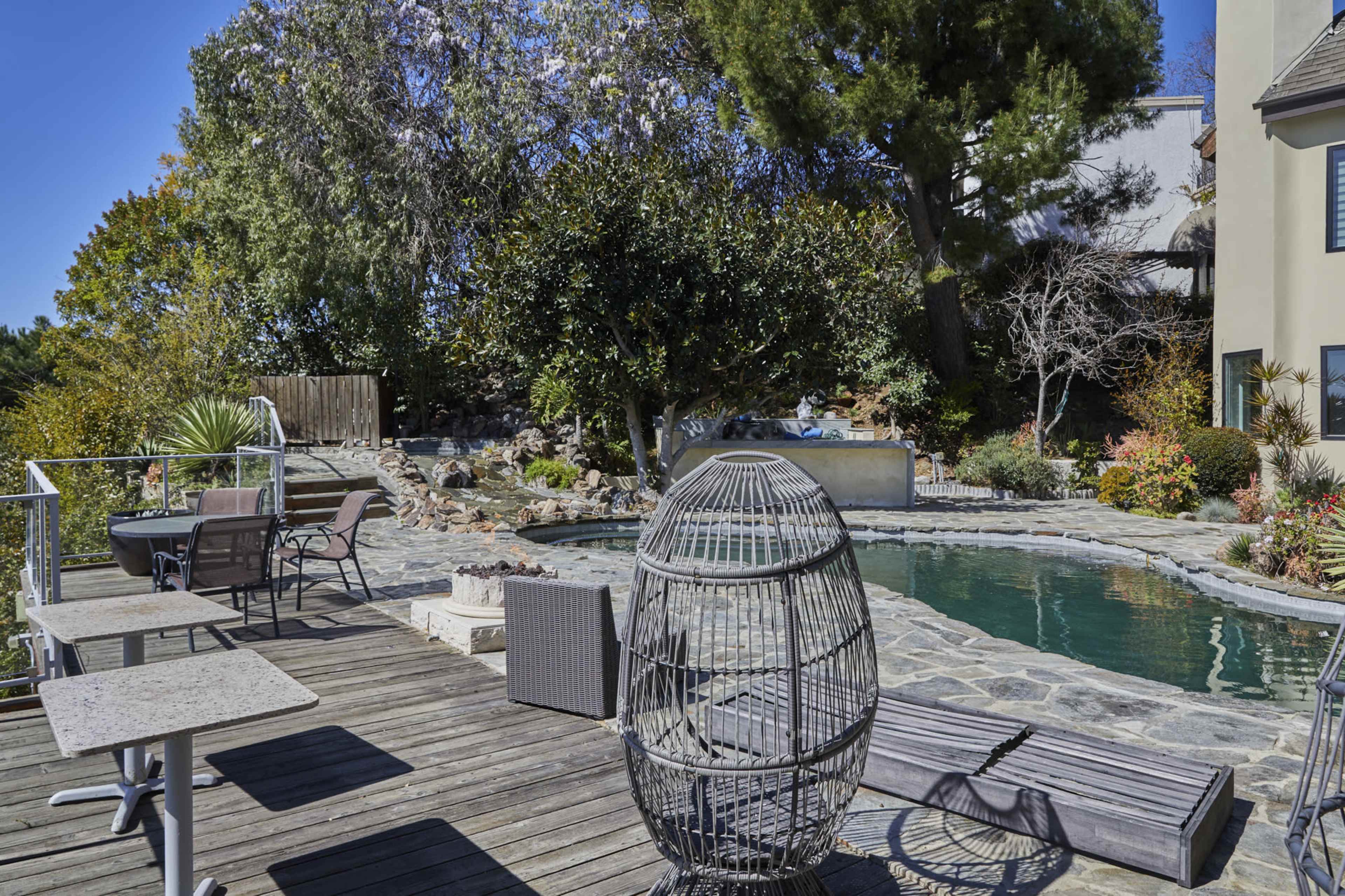 Stunning Bel Air mansion offering breathtaking views of West Los Angeles, rolling hills, majestic mountains, lush greenery, and the sparkling Pacific Ocean Image in Beverly Crest, Los Angeles, CA