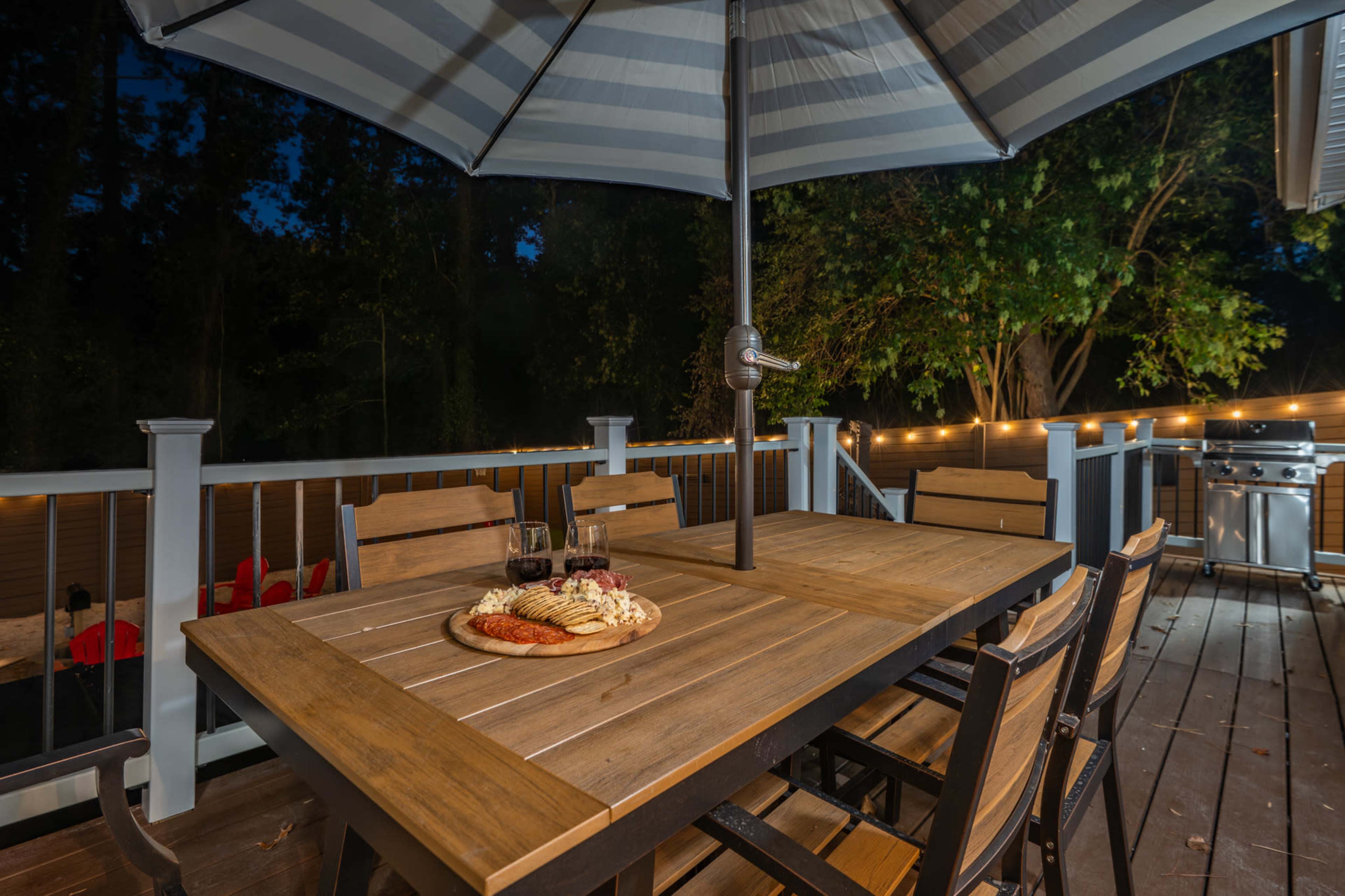 Luxury Backyard Oasis with Hot Tub, Fire Pit, Outdoor Movies, BBQ & Games Image in Pink Acres, Cary, NC