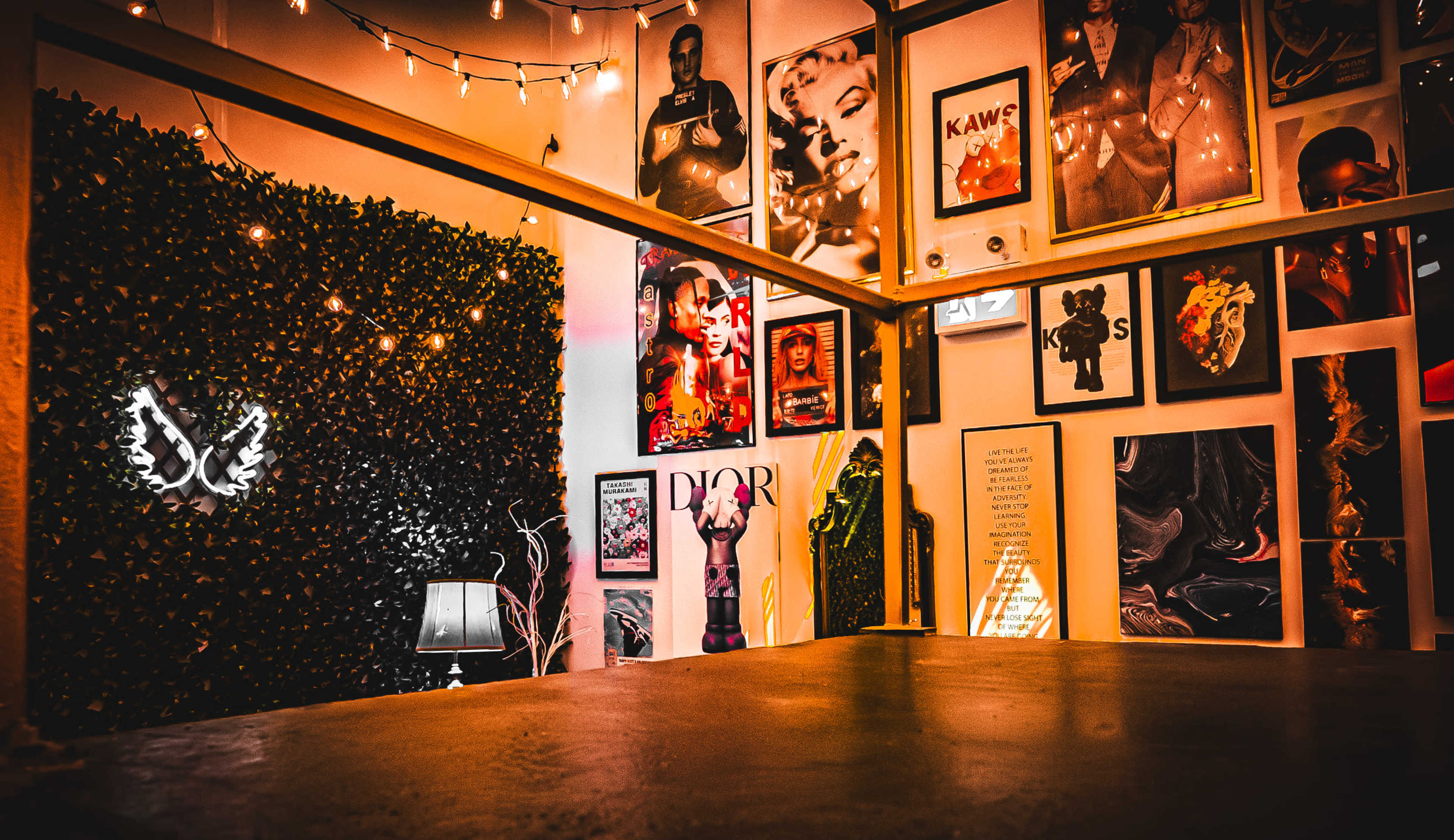 The 777 Lobby Photo & Video Studio with Iconic Poster Wall, Gold Railings, Black Staircase, Ceiling Lights Image in Humber Summit, Toronto, ON