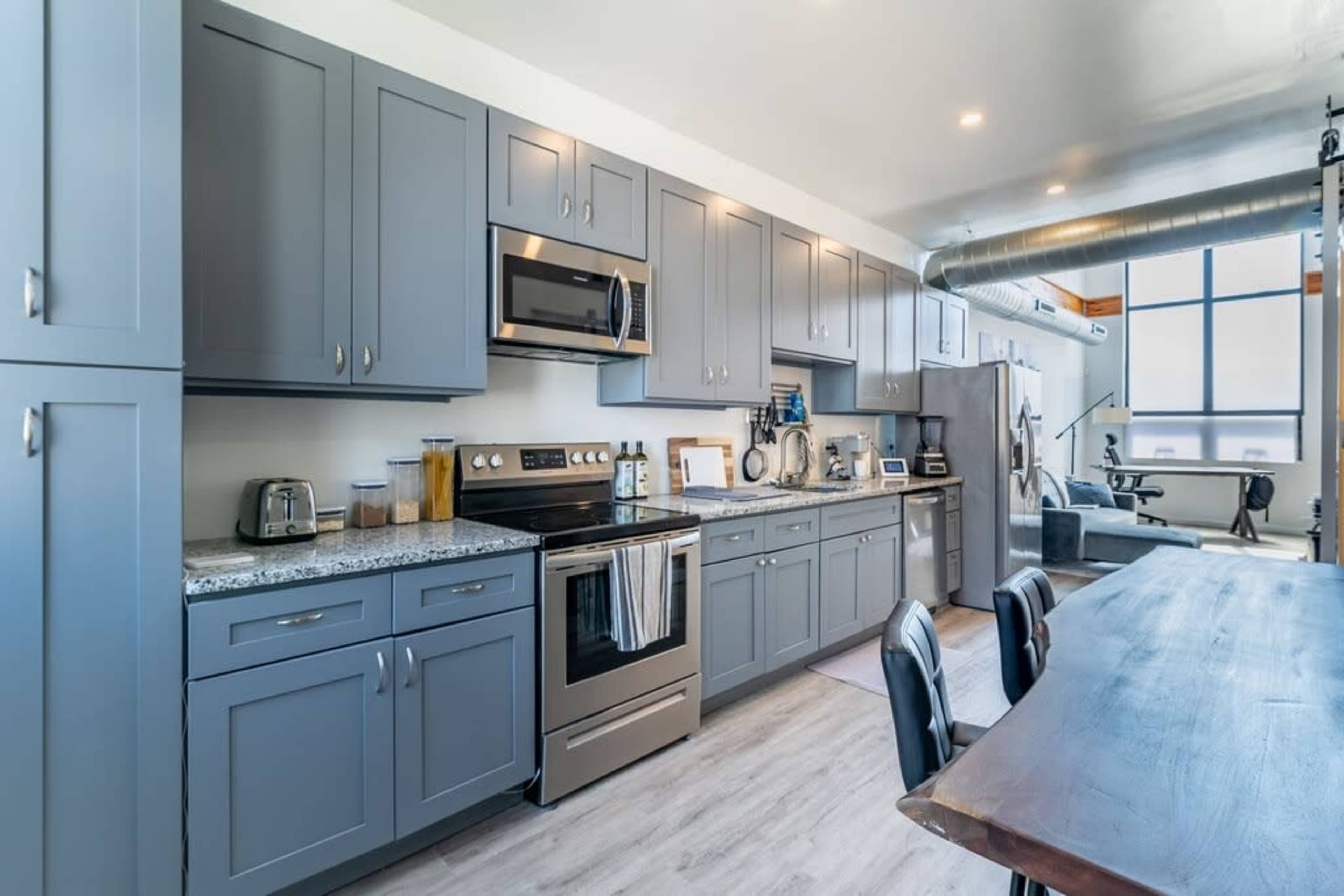 Urban Loft Oasis with Beautiful Natural Light, Piano, & Rooftop with Skyline Views. Image in East Passyunk Crossing, Philadelphia, PA