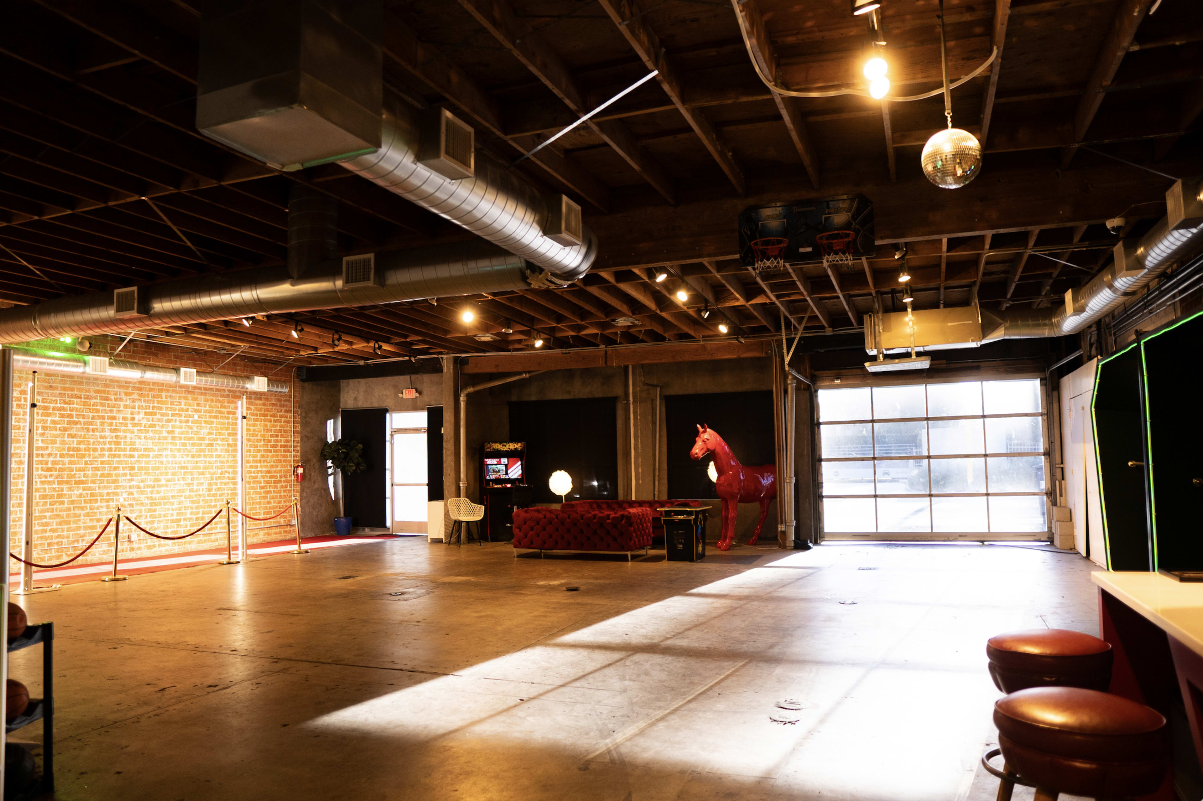 Unique & Spacious Flex Space with Stage | Sound System | Multiple Rooms | Red Carpet | Podcast Studio Image in Mid-City, Santa Monica, CA