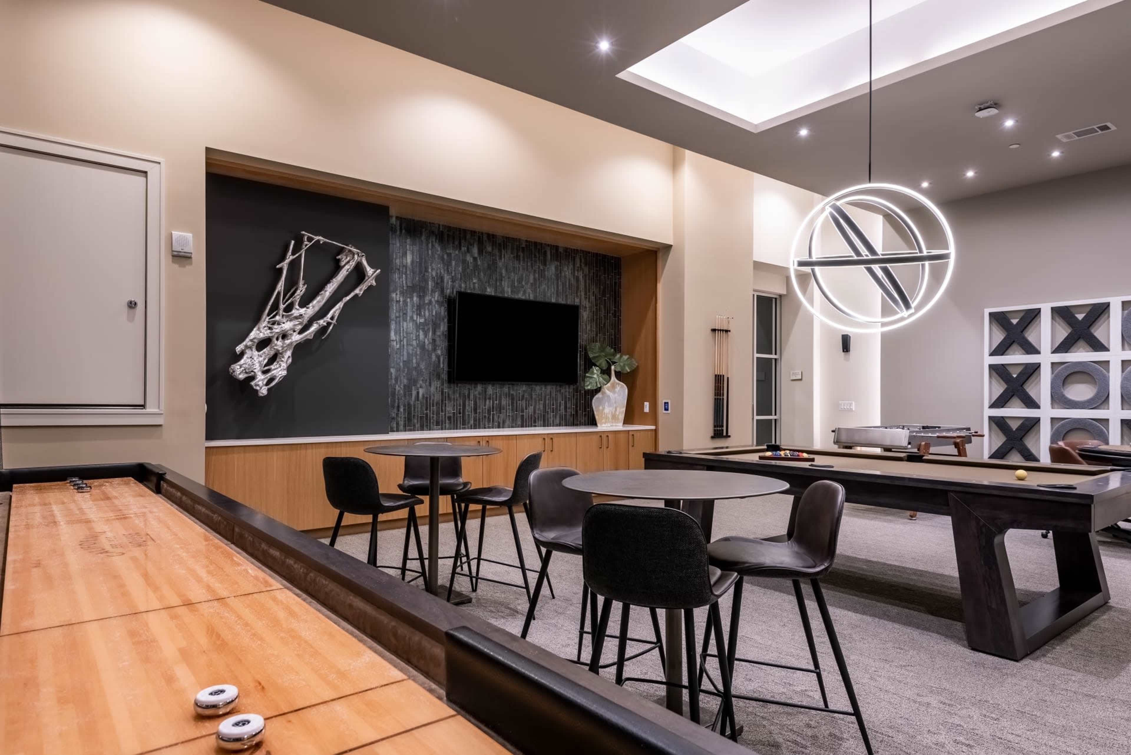 Open Game Room with Shuffleboard, Foosball Table, and Pool Table perfect for your next event Image in Lowry, Denver, CO