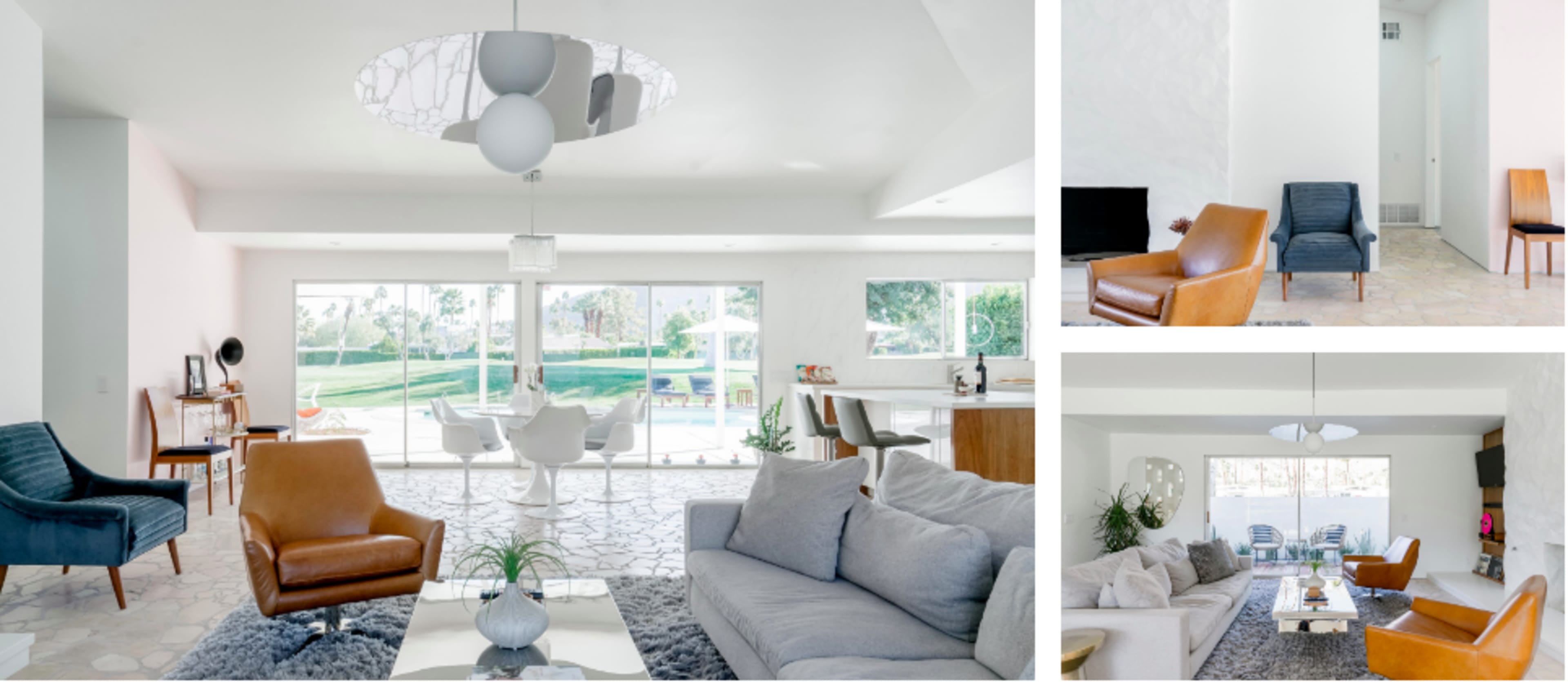 A modern, open-concept living area featuring a grey sofa, brown and blue armchairs, a dining table, and large glass doors that open to an outdoor patio.