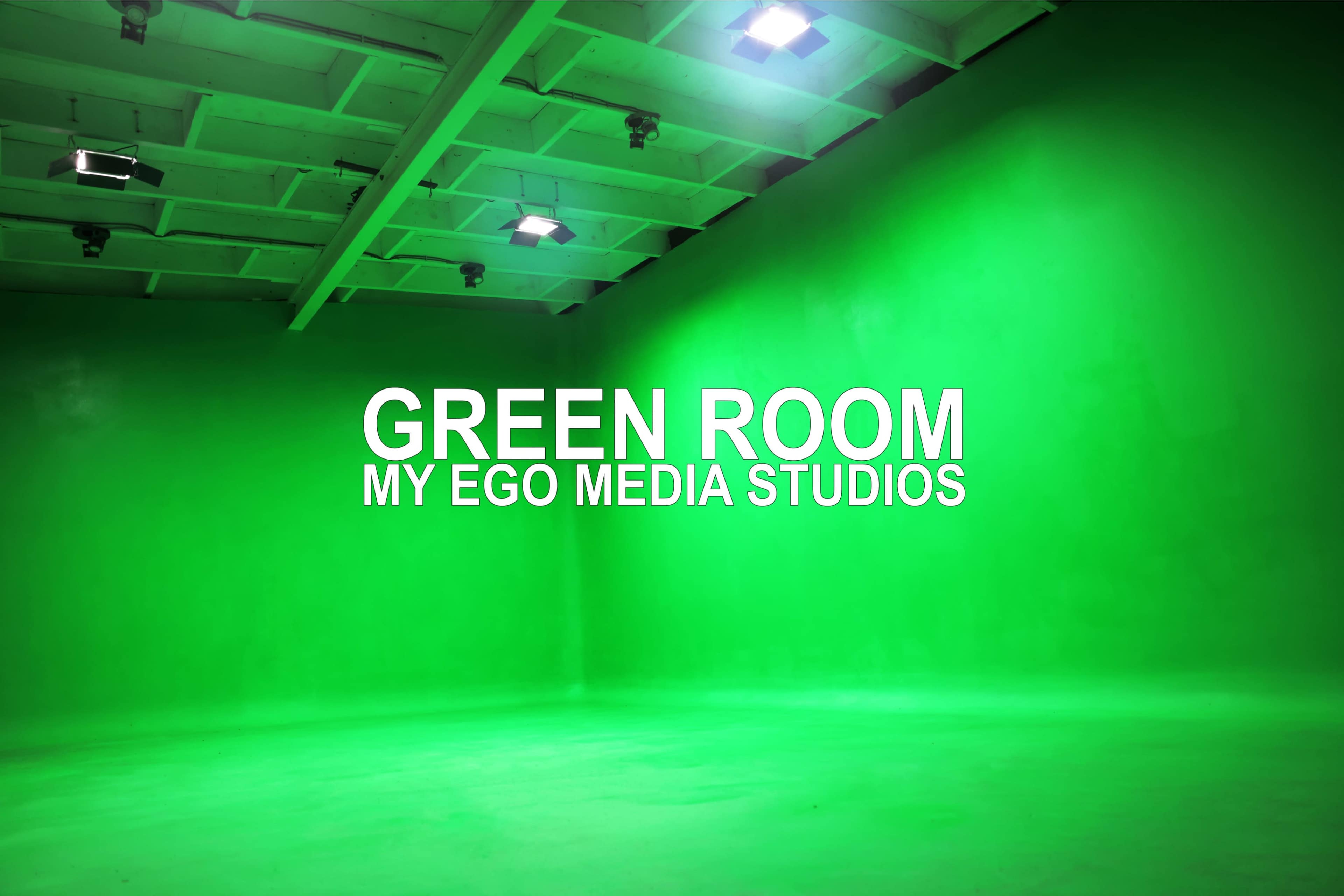 The image shows a green room with bright green walls and ceiling, illuminated by overhead lights, featuring the text "GREEN ROOM MY EGO MEDIA STUDIOS" in large white letters.