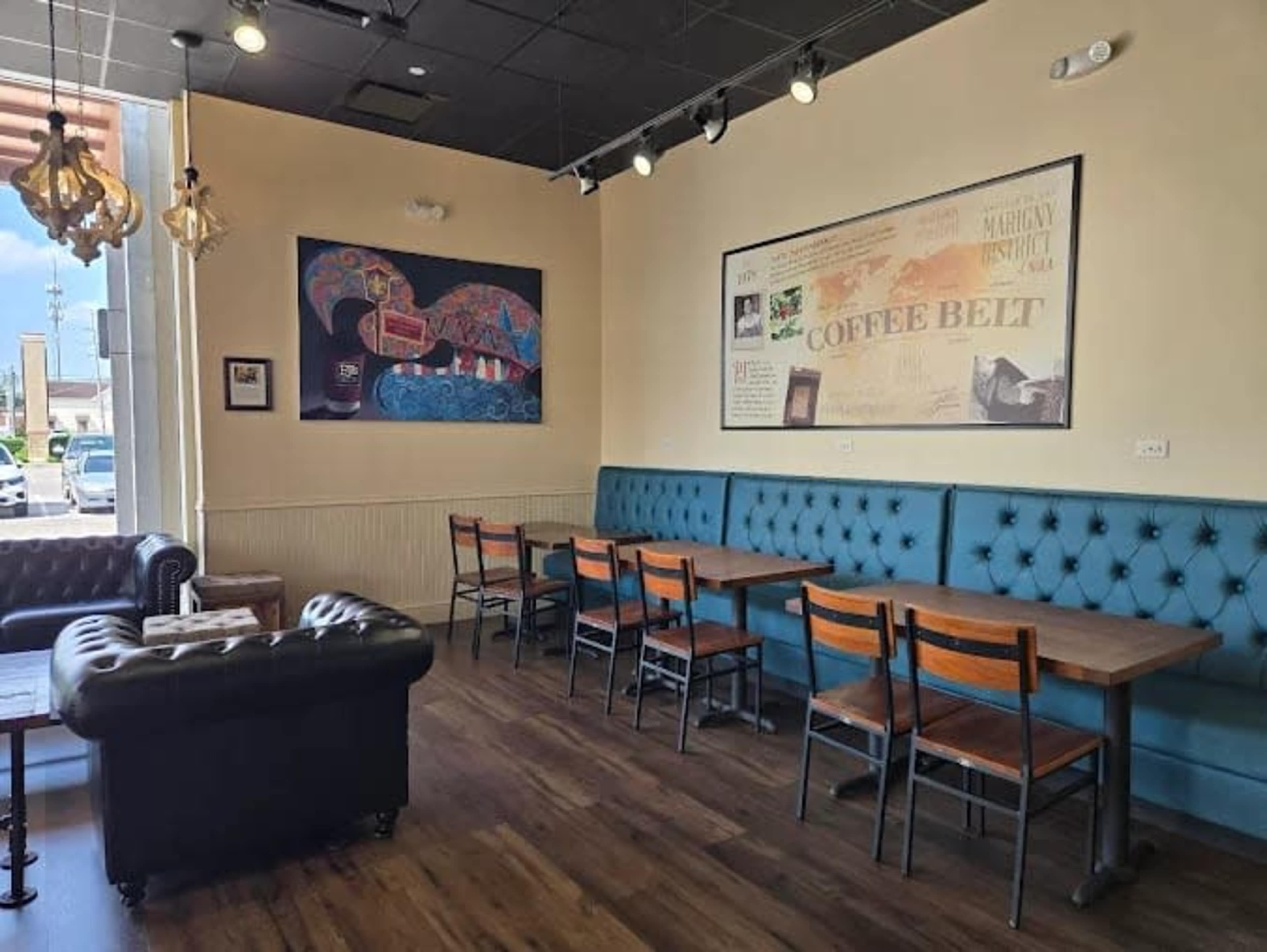 Coffee shop with modern furniture and decor . New Orleans themed vibe so music and happiness are always welcomed Image in , Spring, TX