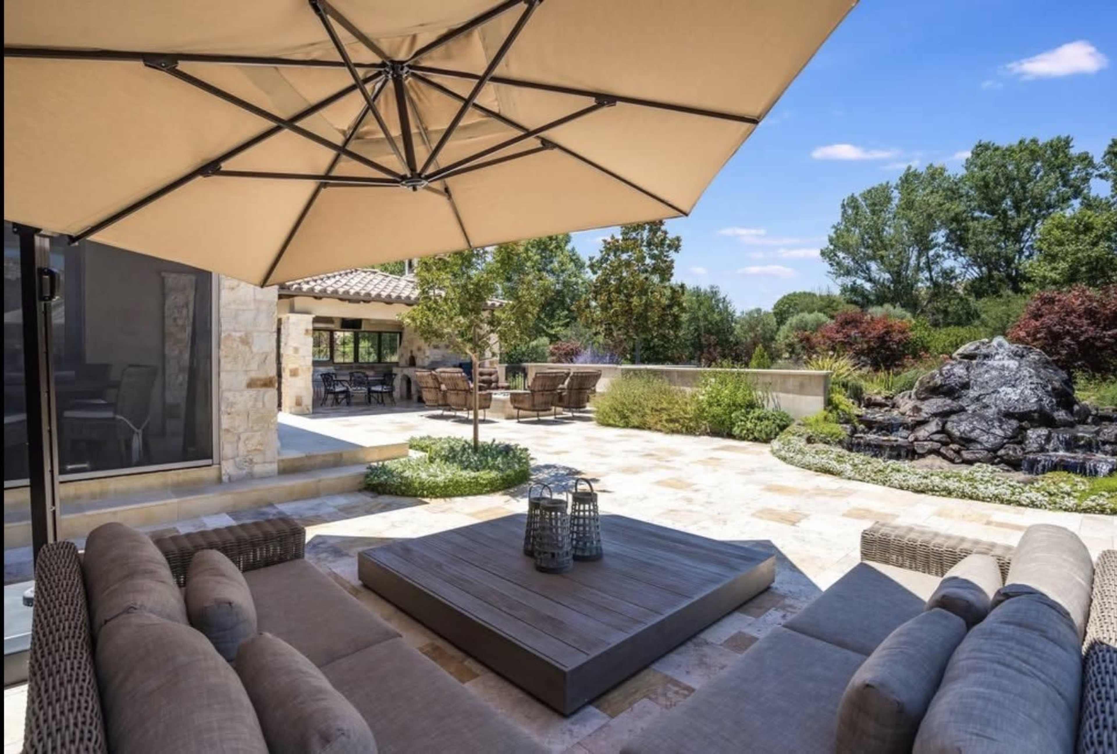 Large Tuscany outdoor with patio overlooking vineyards, mountains and lakes. Image in San Martin, San Martin, CA