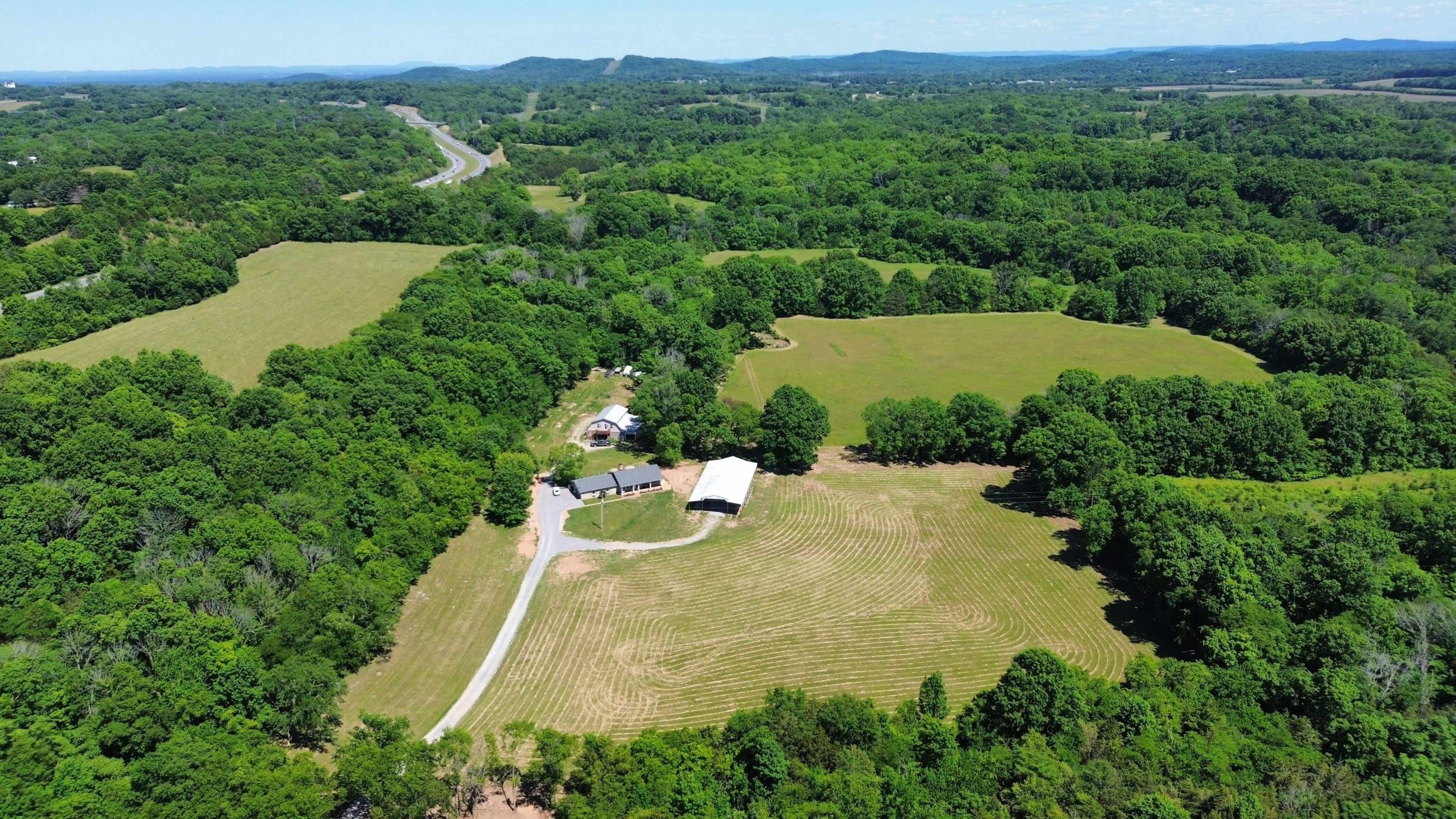 Cinematic Cottage on 20 Acres Near Nashville | Meadow + Barn Image in , Arrington, TN