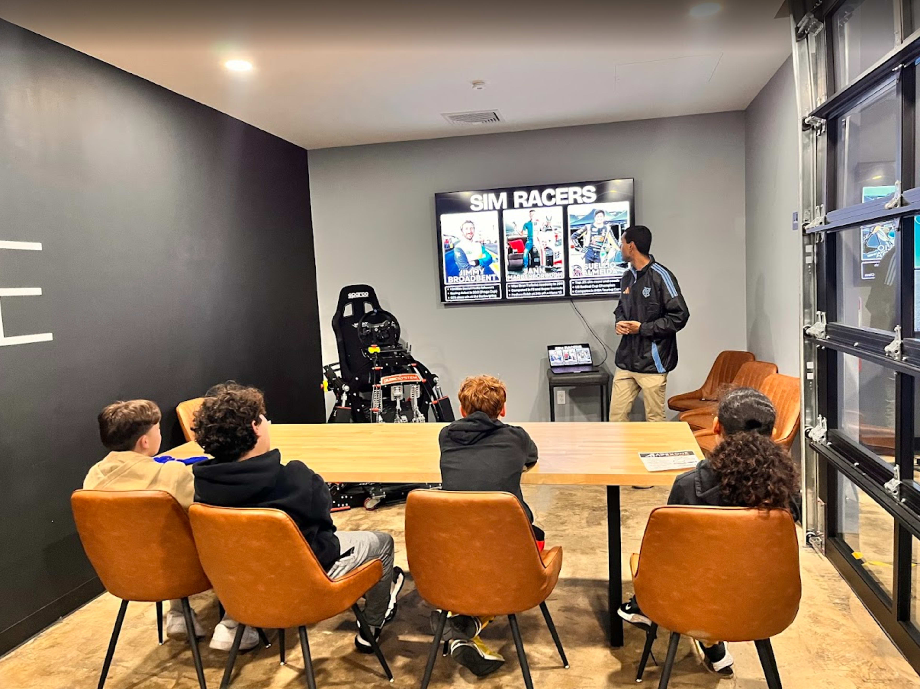 Downtown Sim Racing Center with Industrial Modern Interior Stylings Image in Westfield, Westfield, NJ