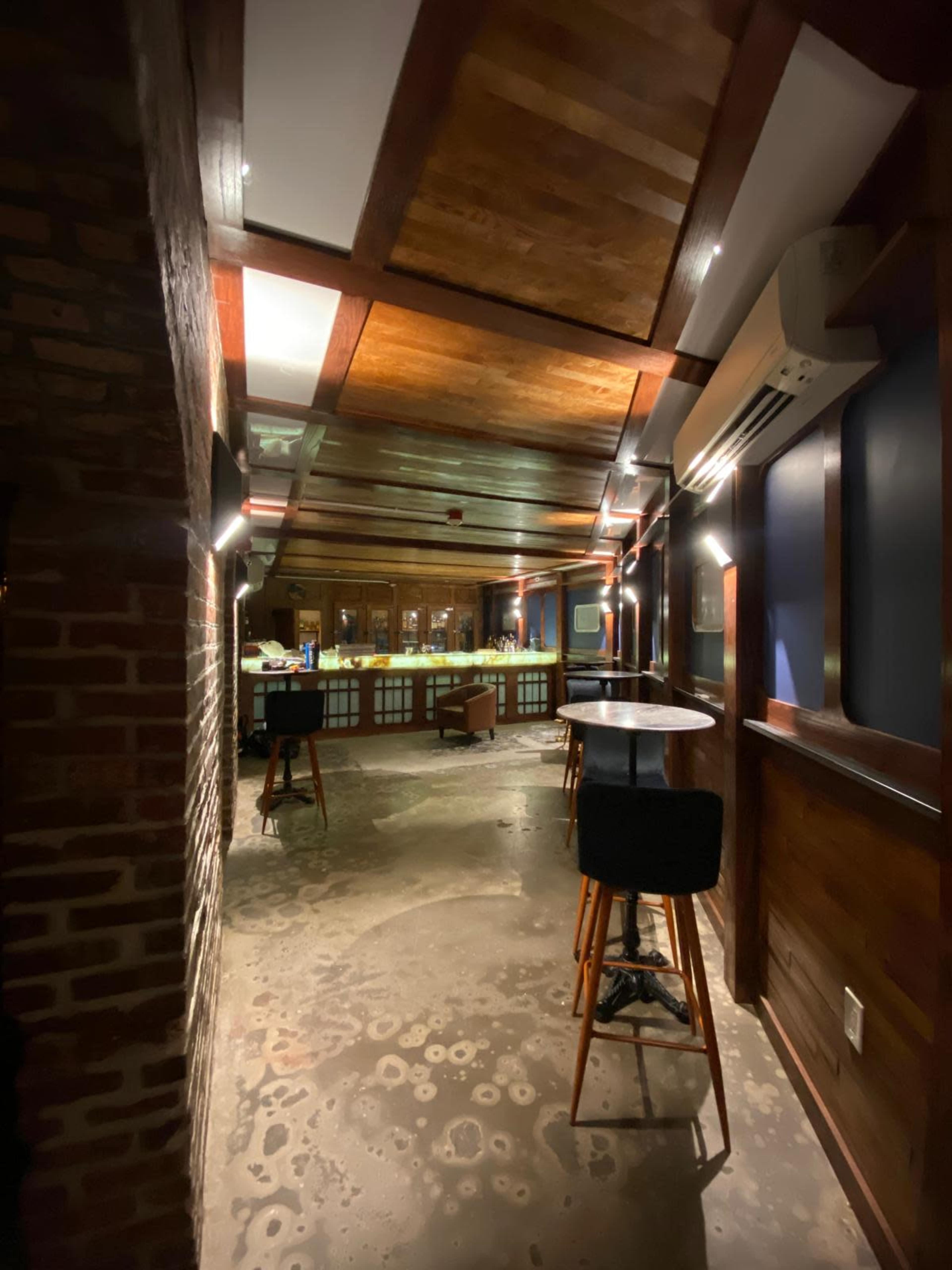 Intimate refined lounge with exposed brick in Park Slope Image in Park Slope, nyc, NY