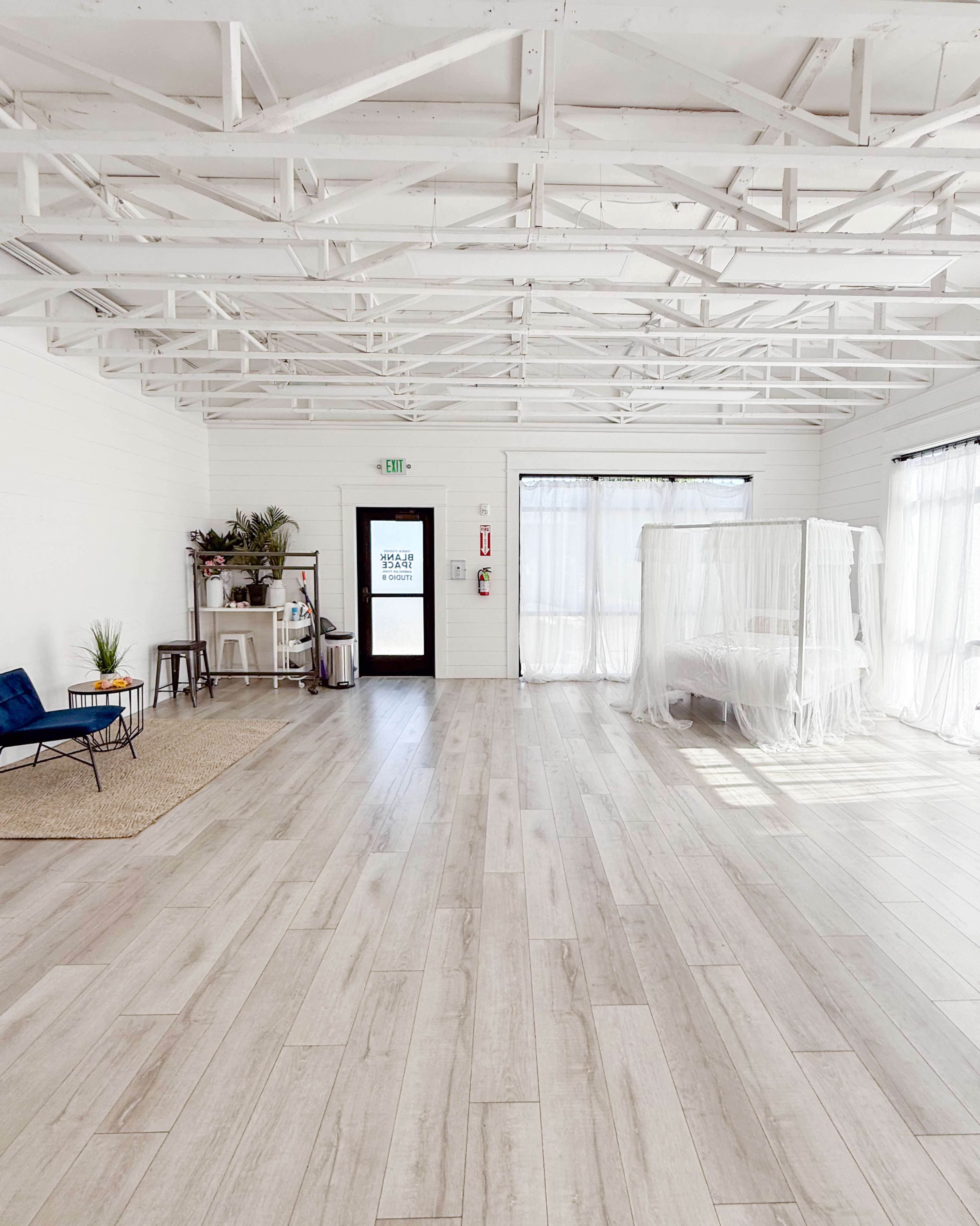 Roomy Photo Studio with Shiplap, White Brick, and Moveable Backdrops Image in American Fork, American Fork, UT