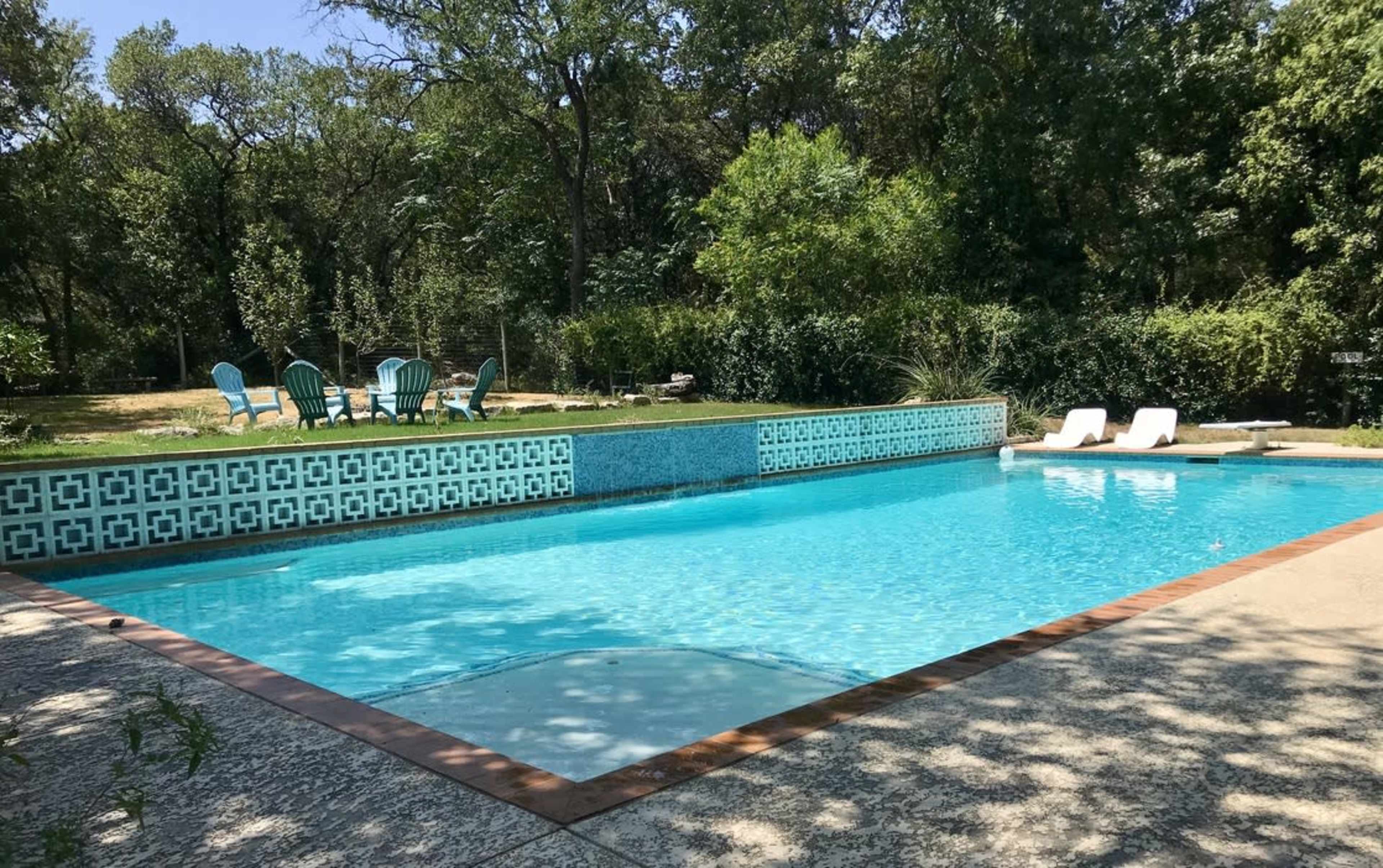 An Eclectic "Austin-tatious"  Large Retro Pool and Gameroom in a spacious private Southwest Austin country setting. Image in Oak Hill, Austin, TX