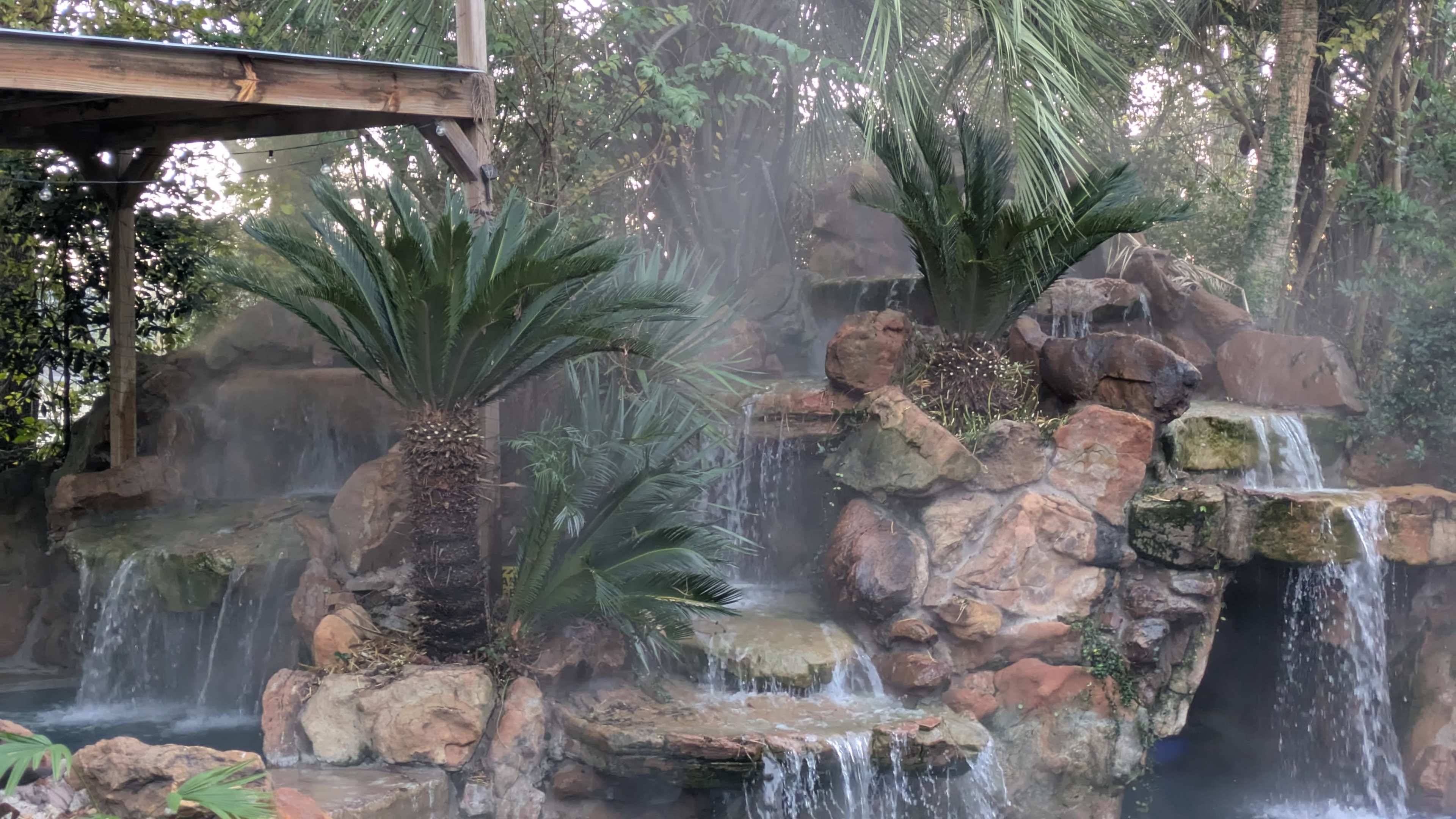 Stunning Tropical Pool and Spa With Boho Interior Image in , Conroe, TX