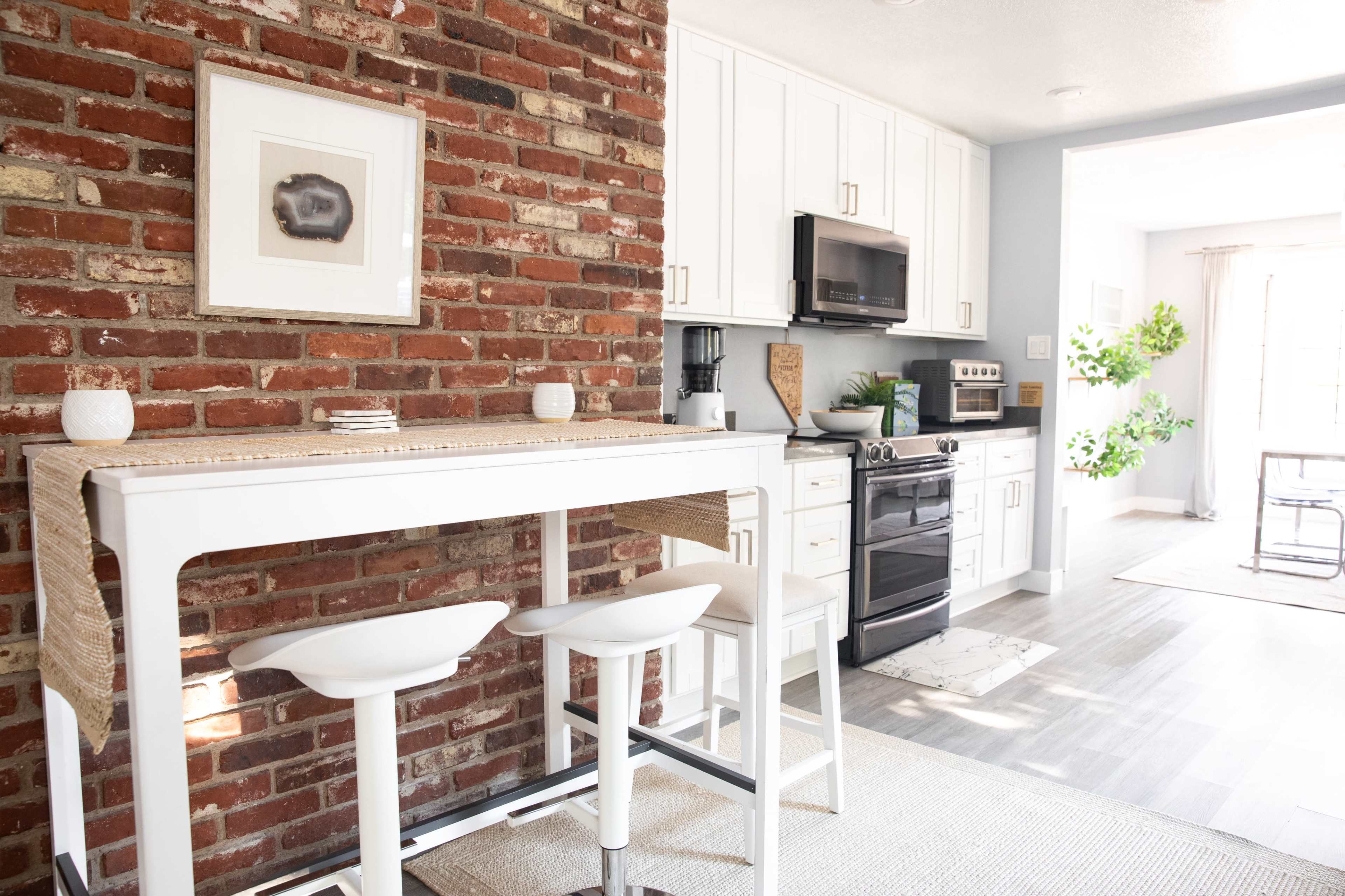 Modern Home with Red Brick and Large Open Layout Image in Twin Lakes, Las Vegas, NV