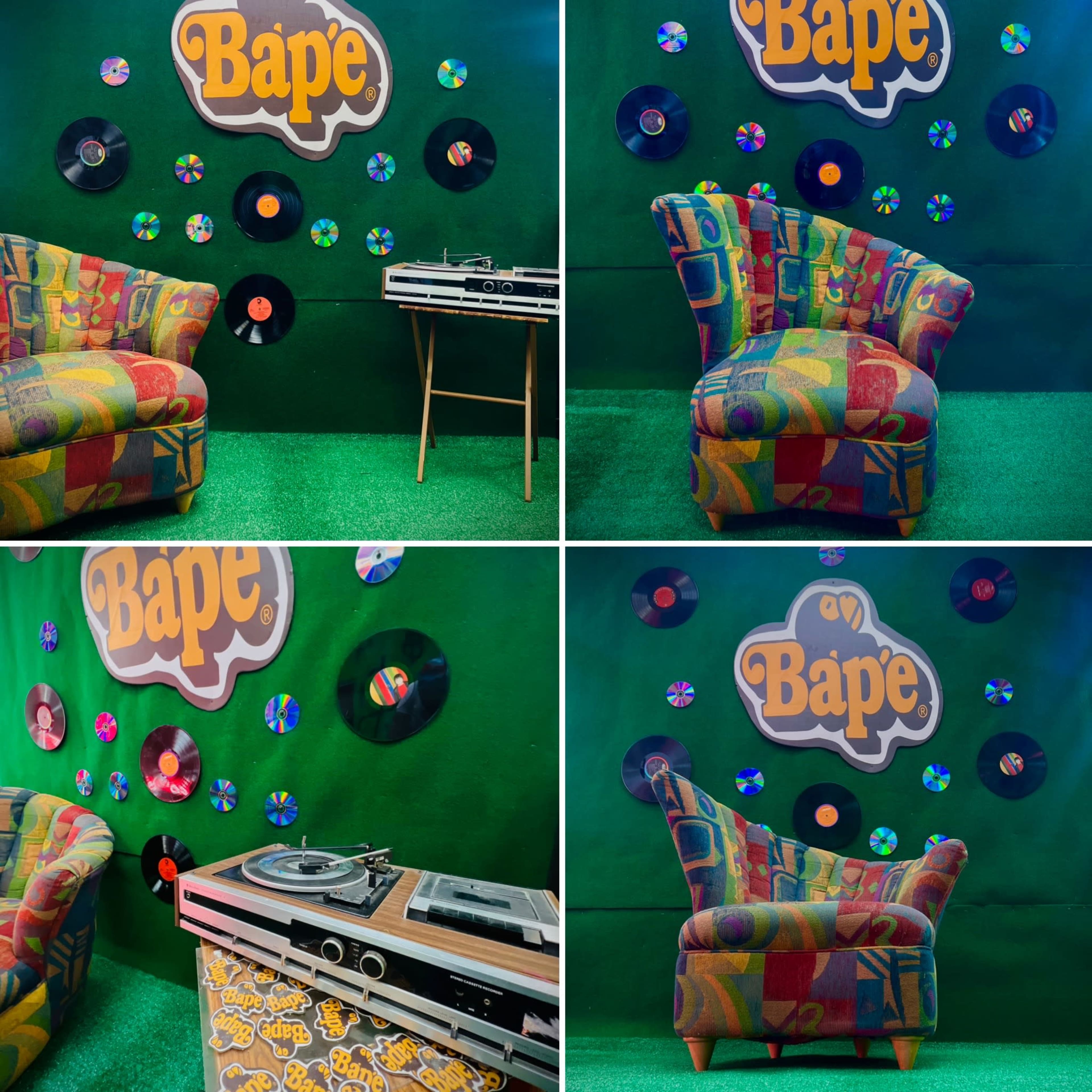The image features a colorful lounge area with a patterned chair and a record player on display against a green wall adorned with vinyl records and the "Bape" logo.