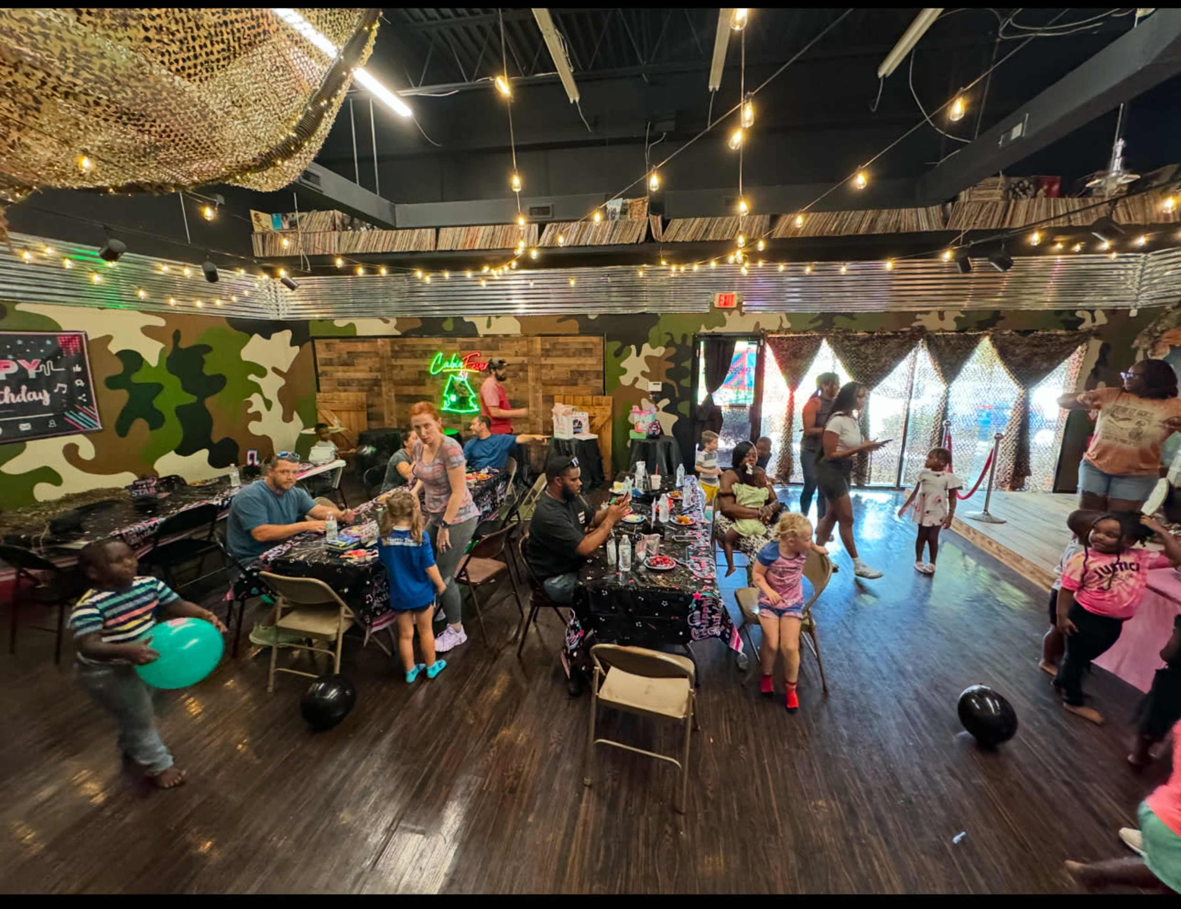Indoor/Outdoor Ambience, prop log cabin with porch/stage, venue Image in Winston-Salem, Winston-Salem, NC