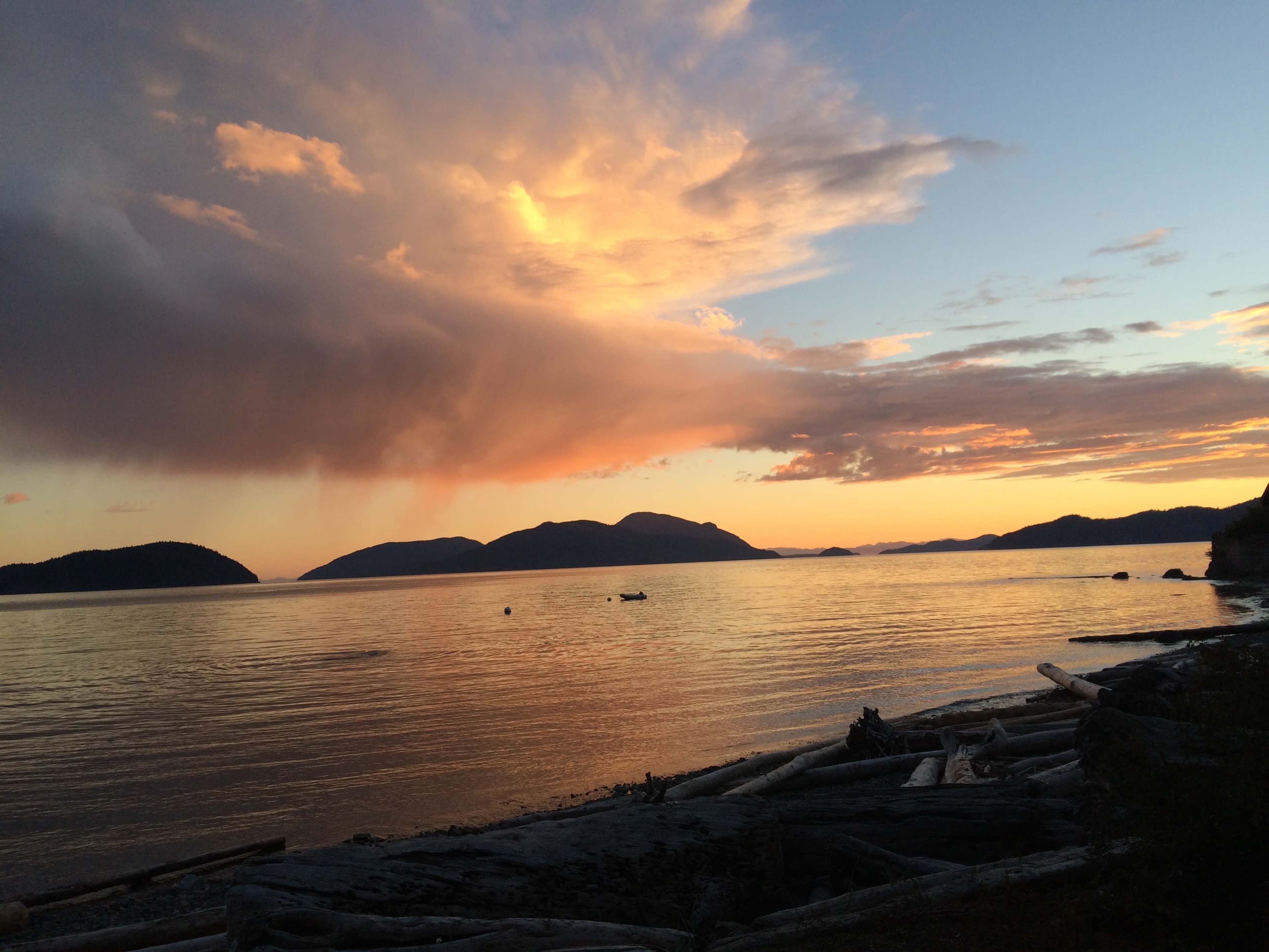 Iconic red couch with ocean view or breathtaking mountain backdrop Image in Lions Bay, Lions Bay, BC