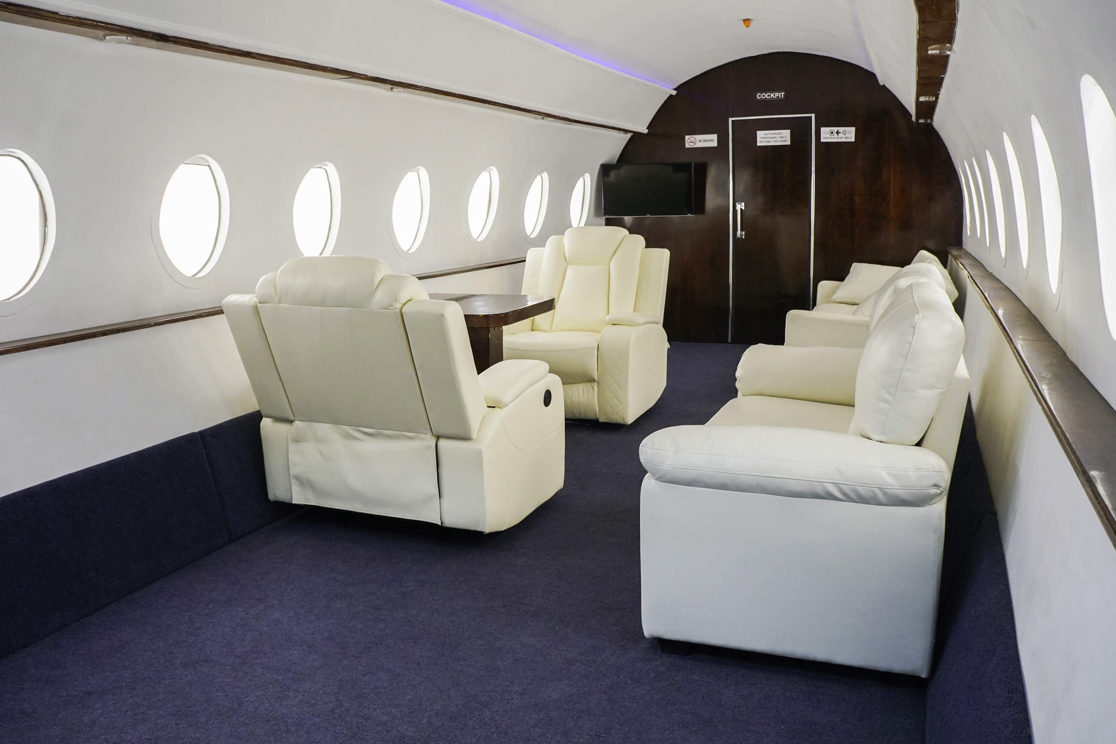 Unique Private jet Studio featured in many Magazines and music videos available for photo & video shoots with free parking - Olympic 4 Image in Boyle Heights, Los Angeles, CA