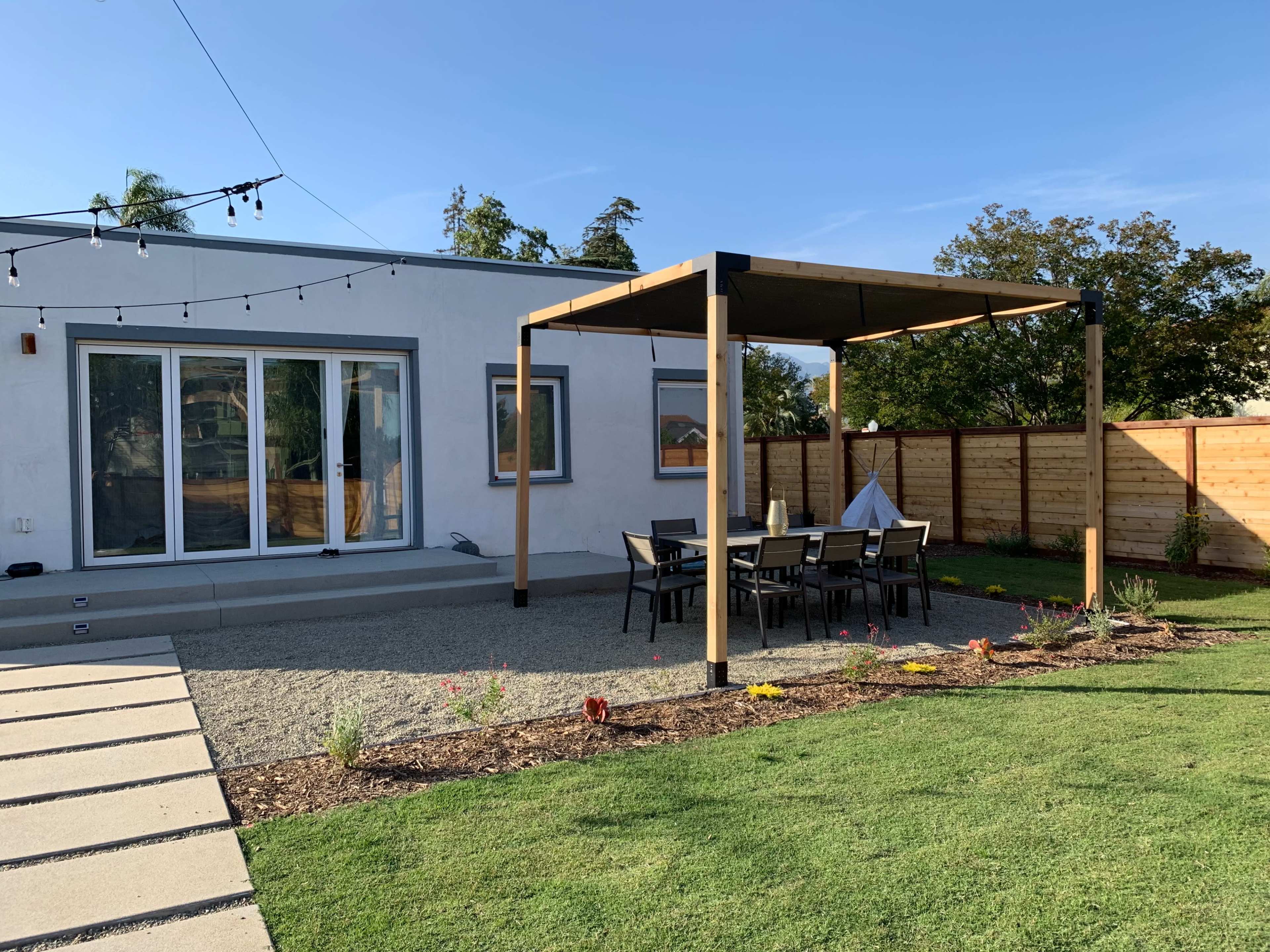 Modern suburban backyard with firepit and pergola Image in Alhambra, Alhambra, CA