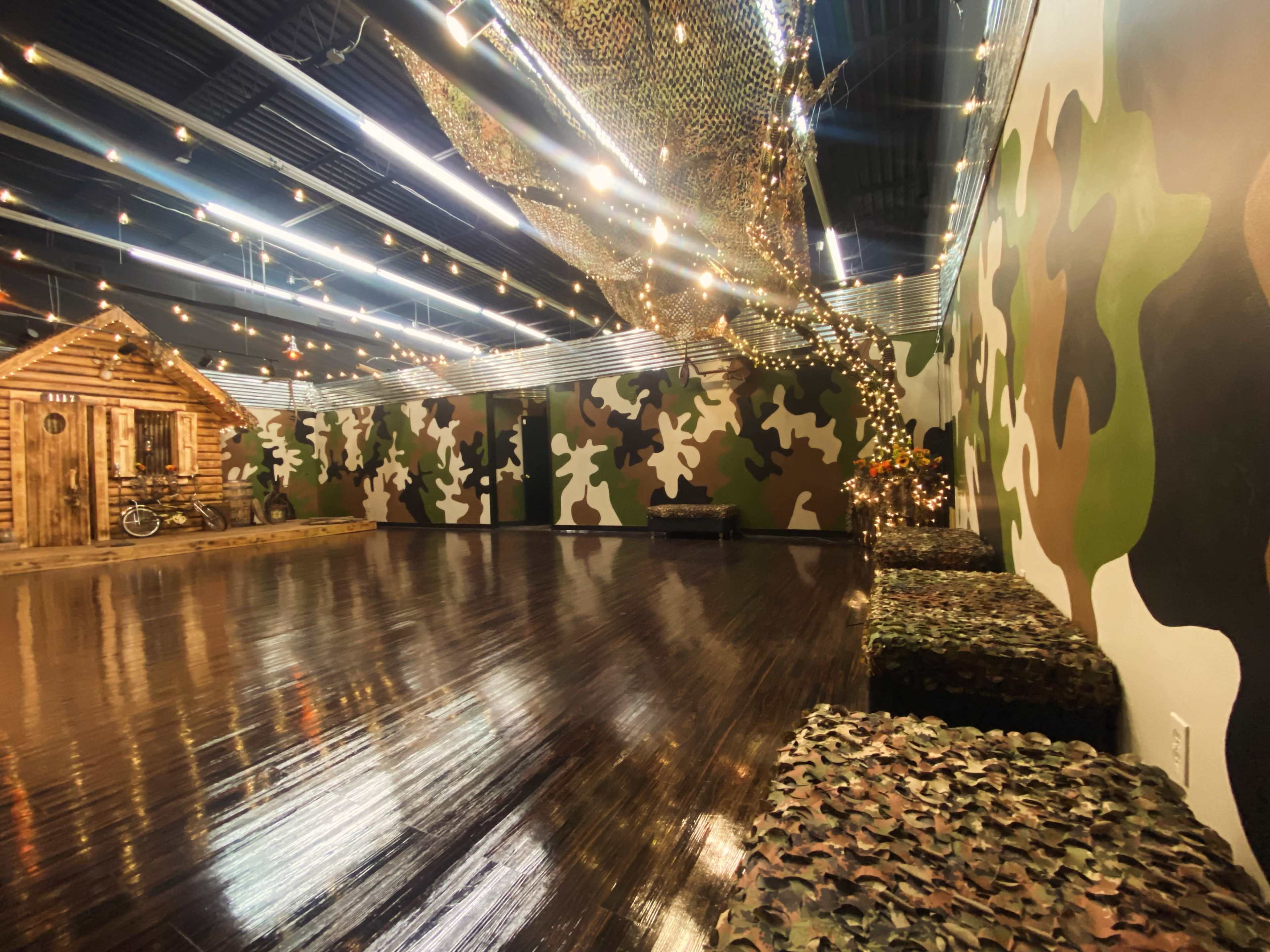 Indoor/Outdoor Ambience, prop log cabin with porch/stage, venue Image in Winston-Salem, Winston-Salem, NC
