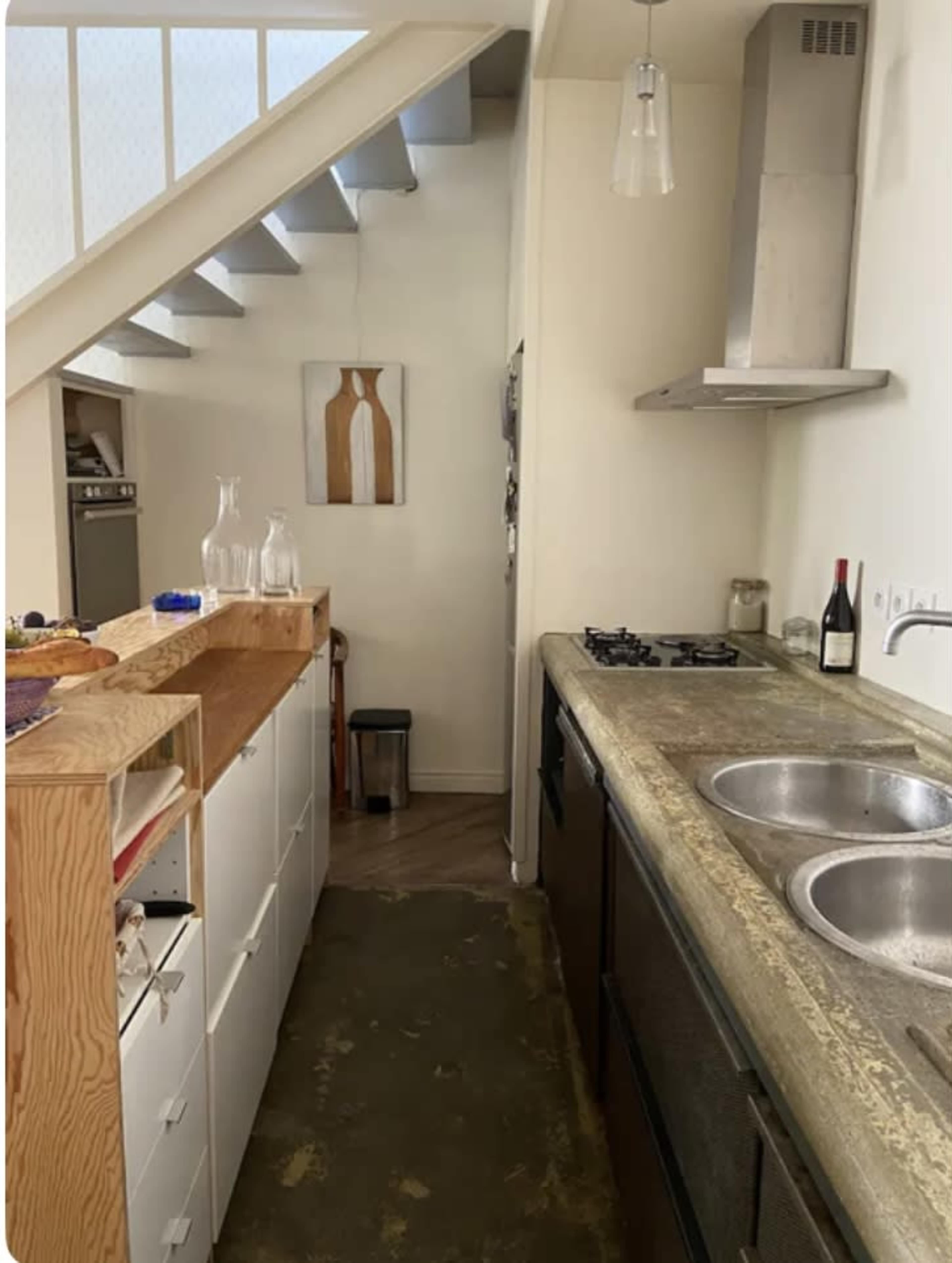 Appartement d’architecte en duplex, ambiance maison de ville Image in Villette, Paris