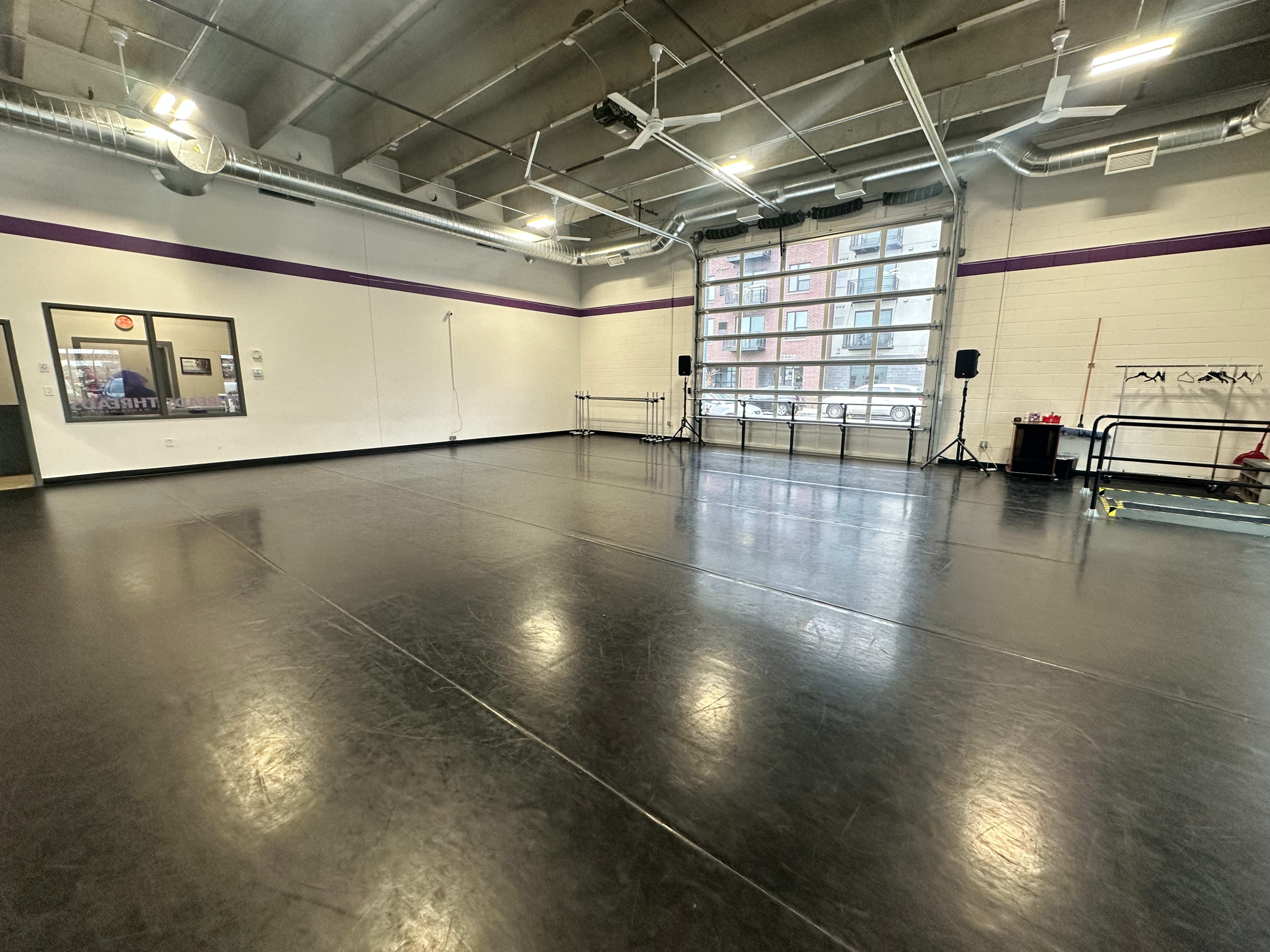Industrial Dance Studio with Floor to Ceiling Windows Image in Seward, Minneapolis, MN