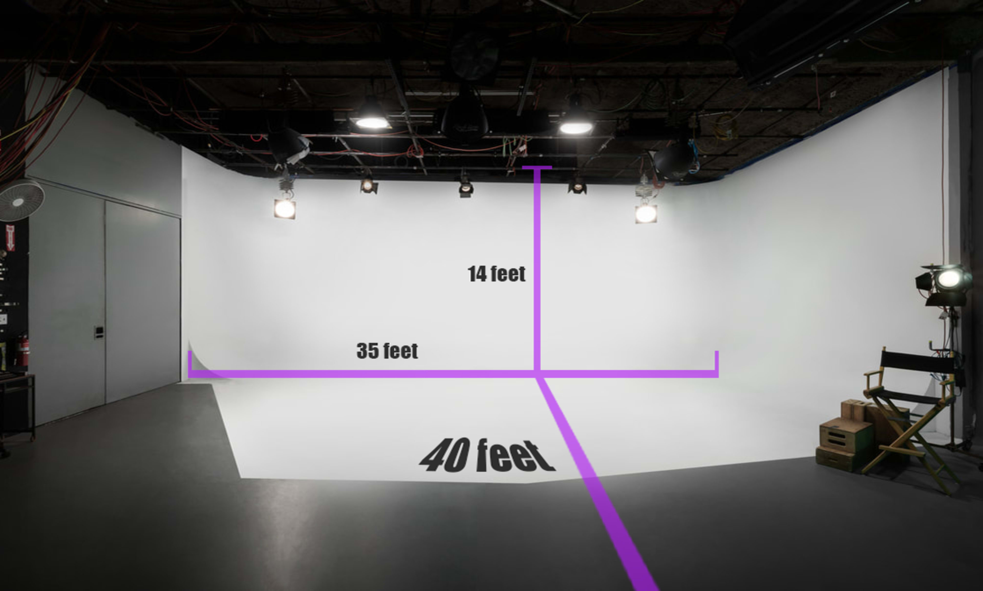 The image shows a spacious photography studio with a white backdrop and marked dimensions of 40 feet by 35 feet, including a height of 14 feet.