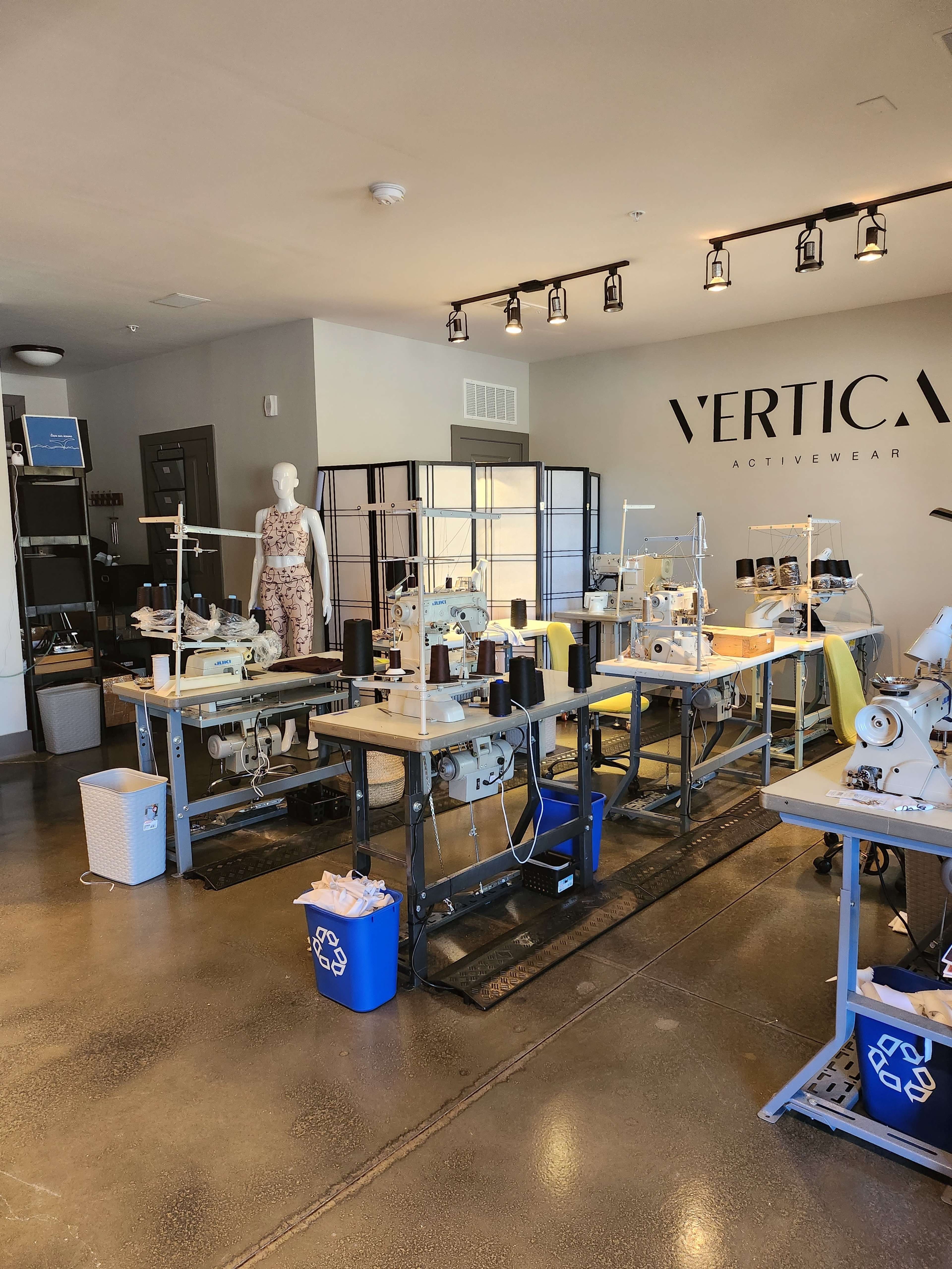 Intimate Sewing Studio with Industrial Machines & Photography Wall Image in Duluth, Duluth, GA