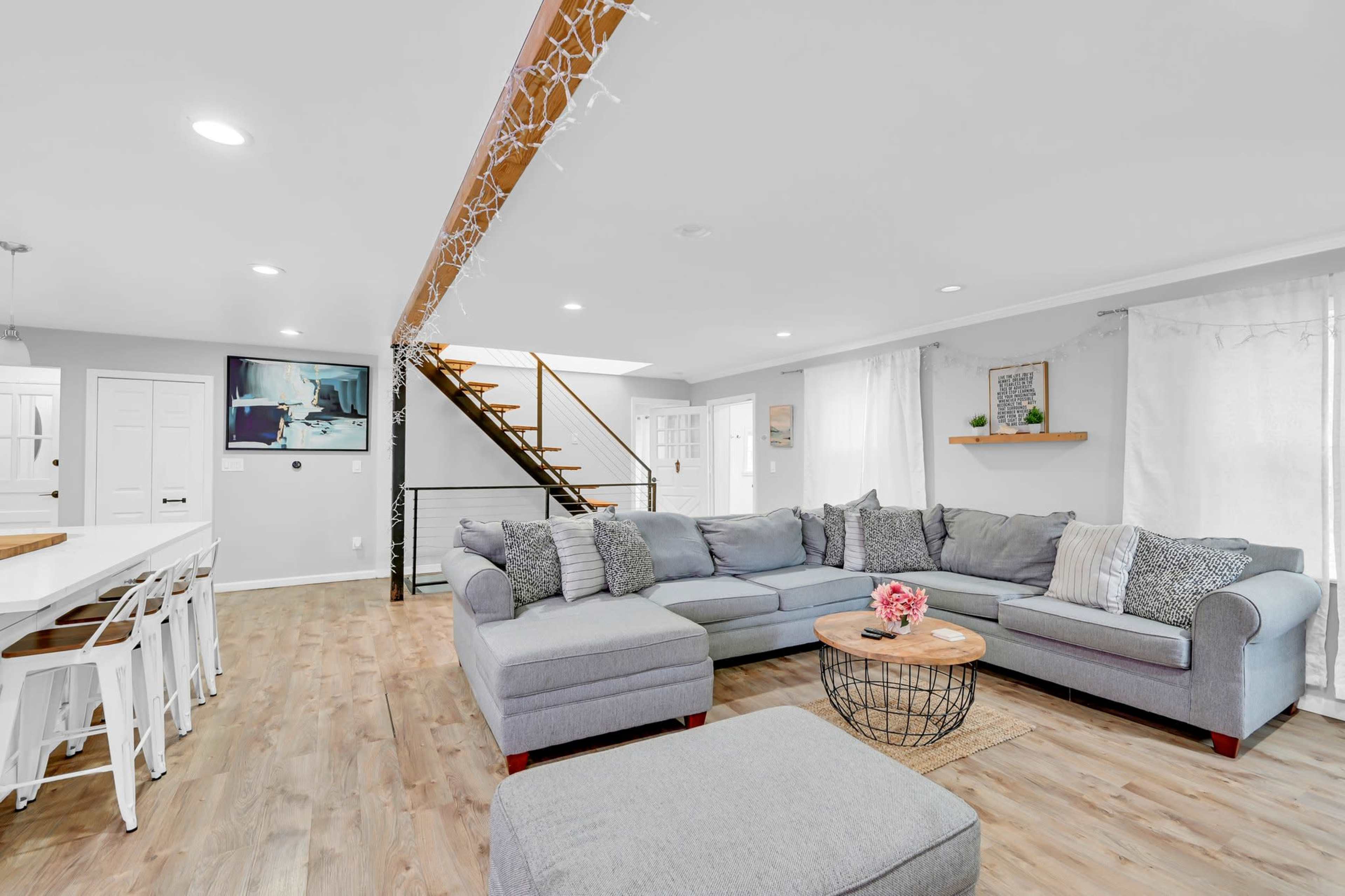 Modern Open Concept Entire single family home with basketball court and full deck in the back yard. Small creek runs as well on side of property. Image in Englewood, Englewood, NJ