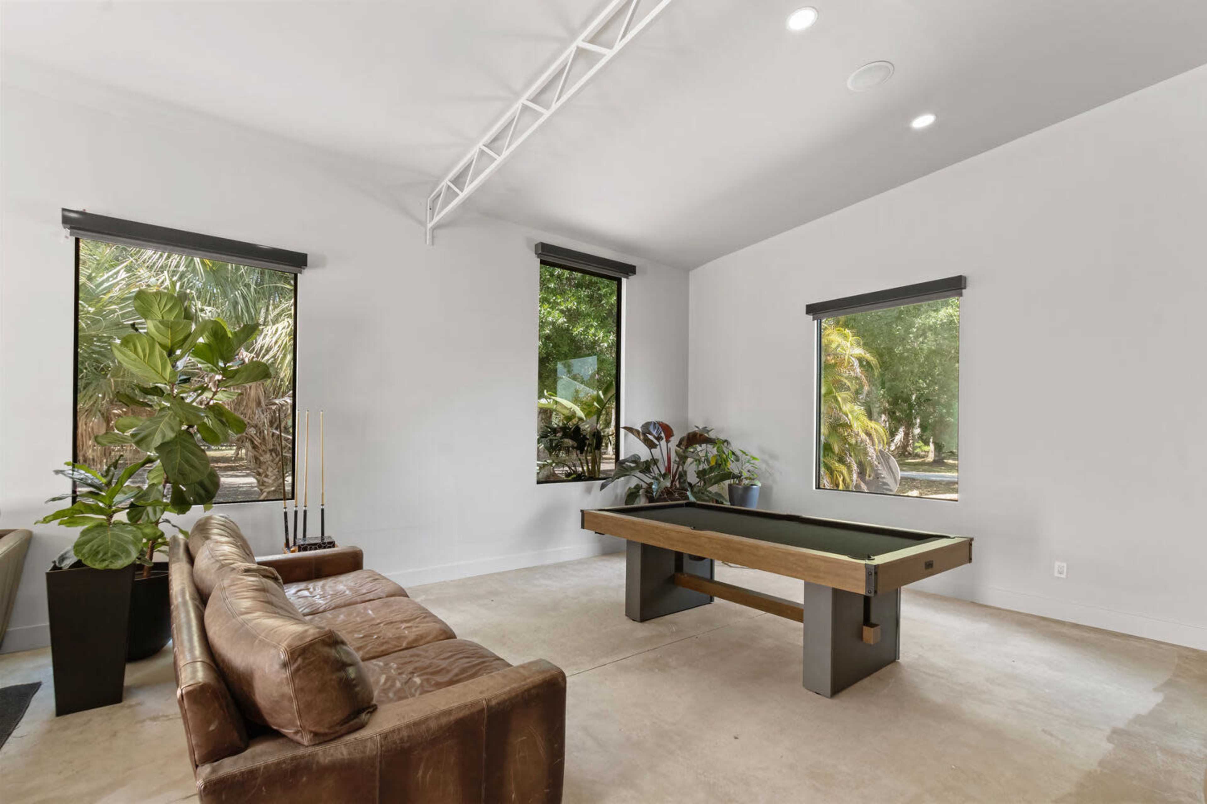 Luxury Farm Barn Loft Indoor and Outdoor Space with Farm Animals, Horses, and Vintage Cars Image in Jupiter Farms, Jupiter, FL