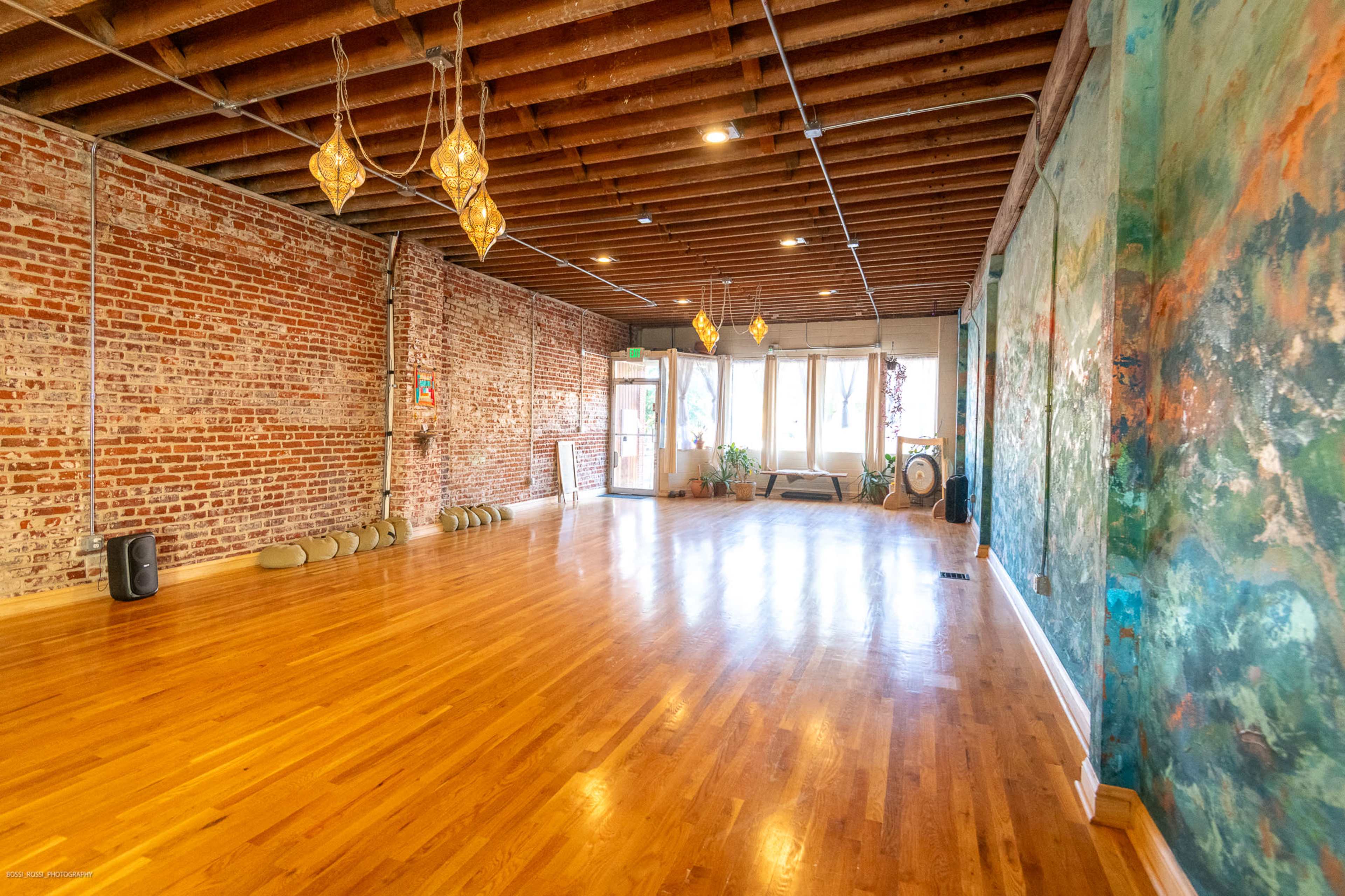 Urban Boutique Yoga Studio with Exposed Brick and Artisan Lights Image in Englewood, Englewood, CO