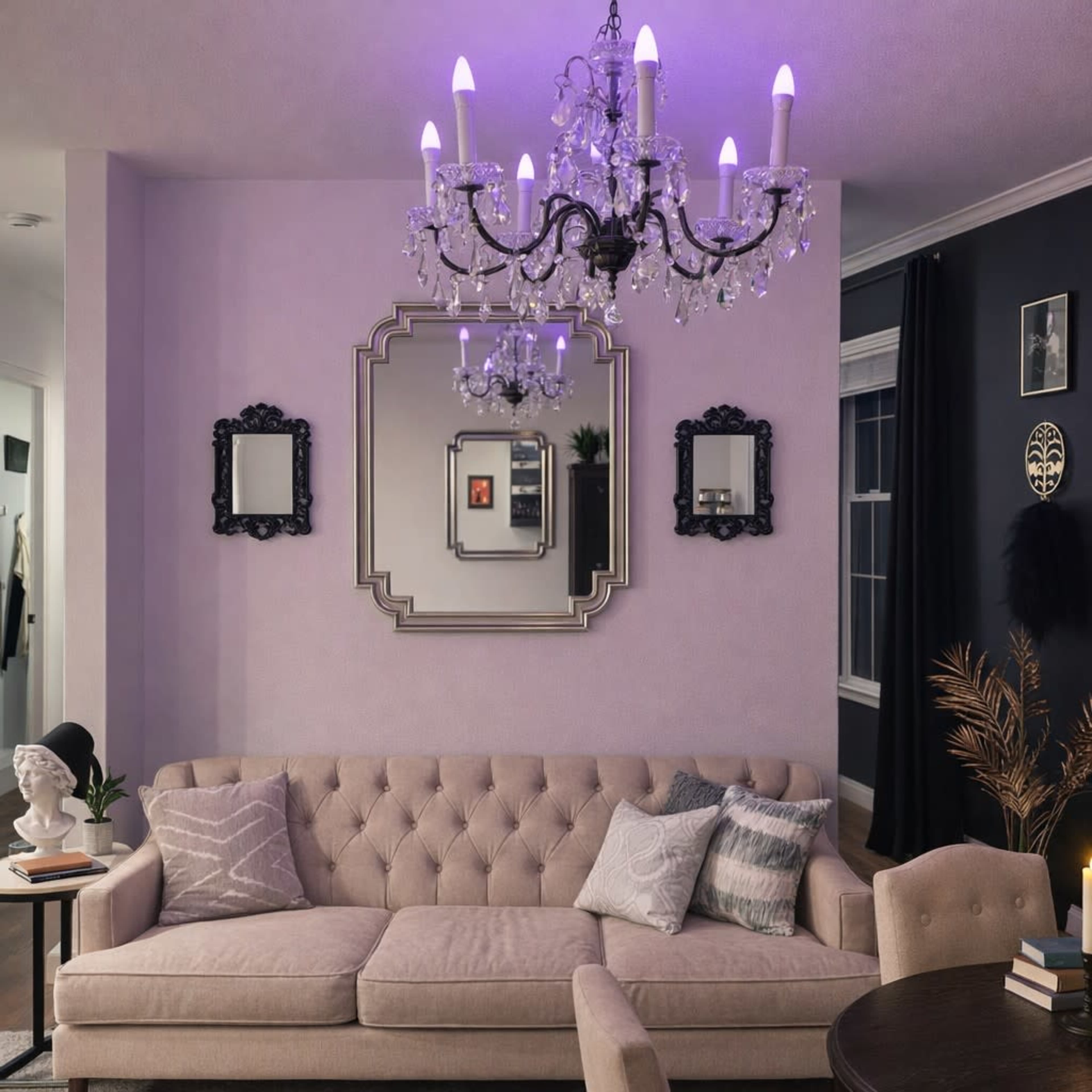 The living room features a tan tufted sofa, a decorative chandelier with purple lights, and two mirrored wall decorations.