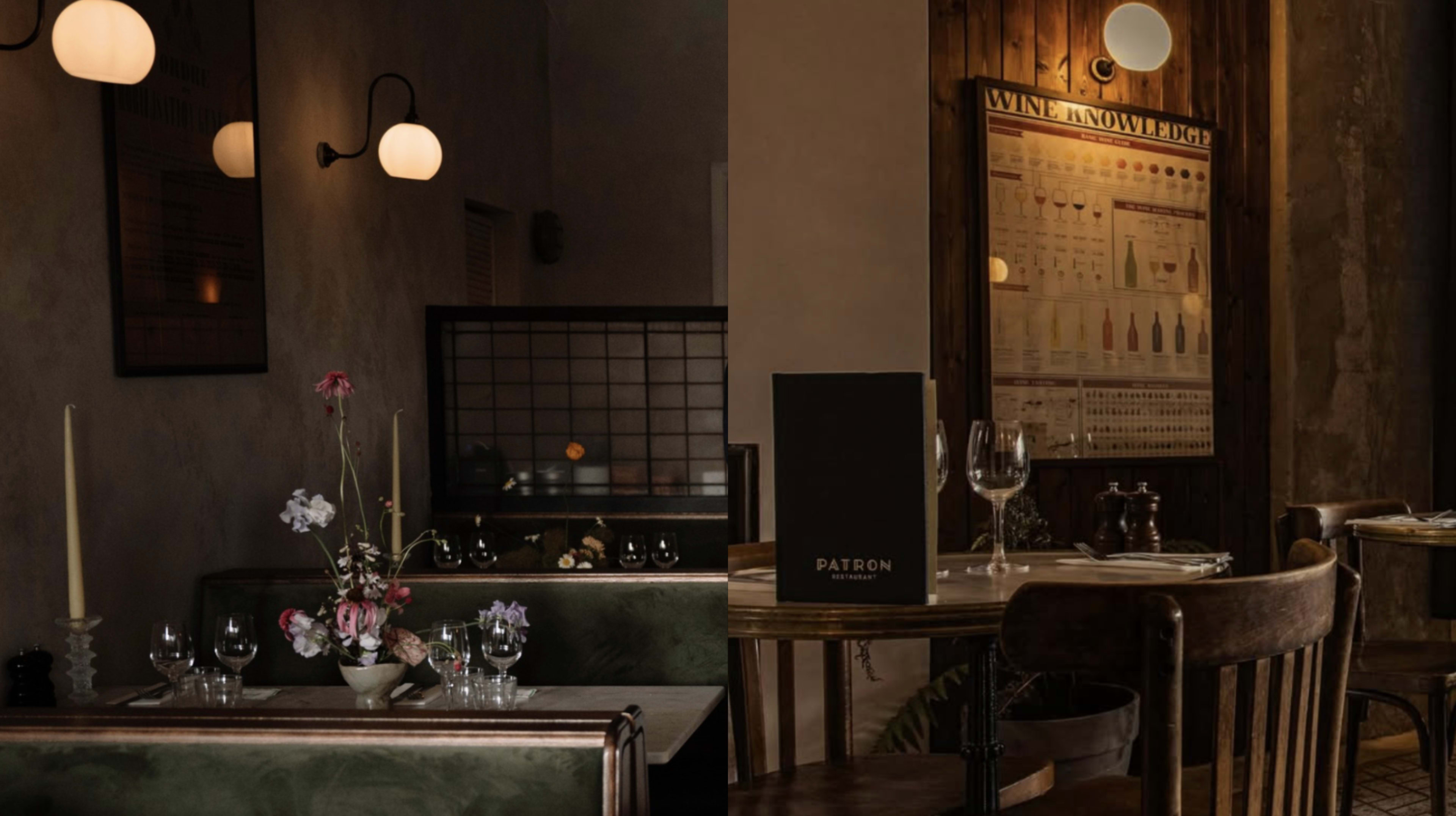 The image depicts a dimly lit restaurant setting featuring a combination of elegant tables with glassware and a decorative floral centerpiece against a backdrop of wine listings and warm lighting.