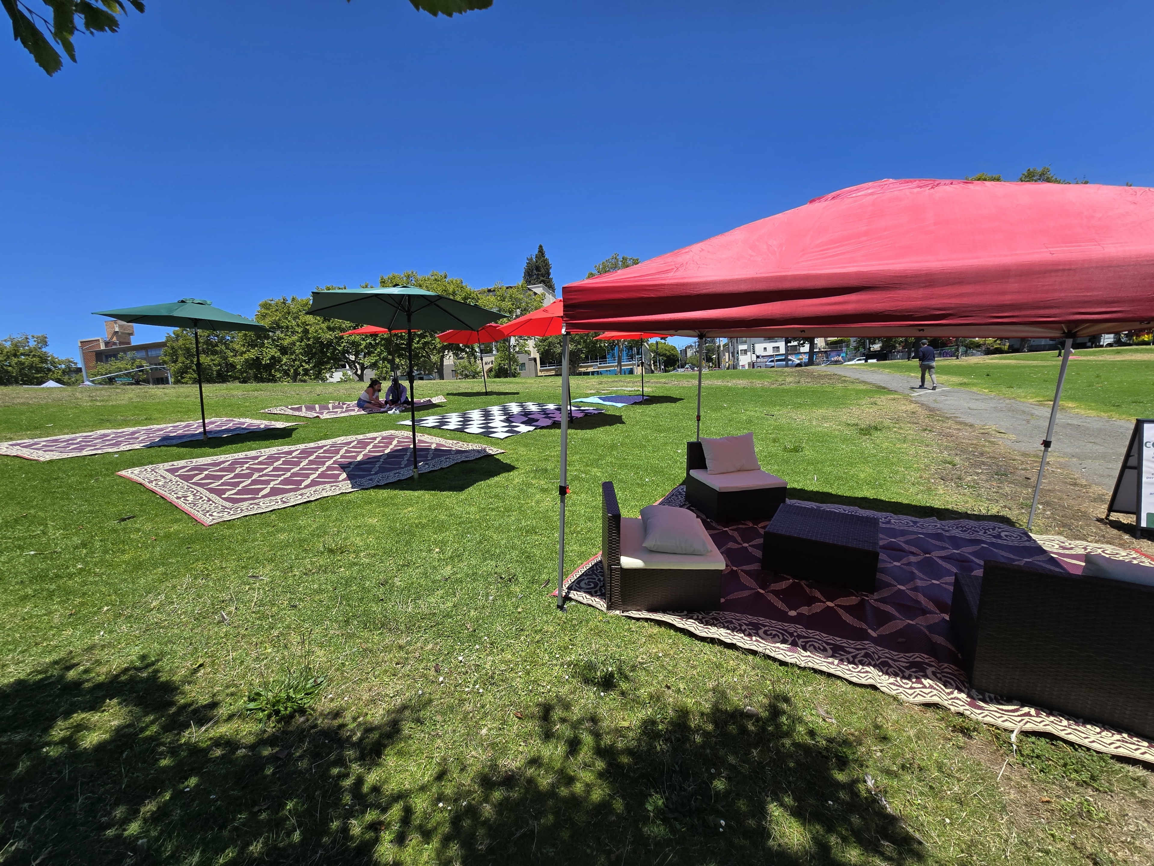 Ashe Umbrella Project - Lakeside Premium Umbrella Oasis Ashé Cafe with Gigabit Internet & Secure Parking Image in Cleveland Heights, Oakland, CA