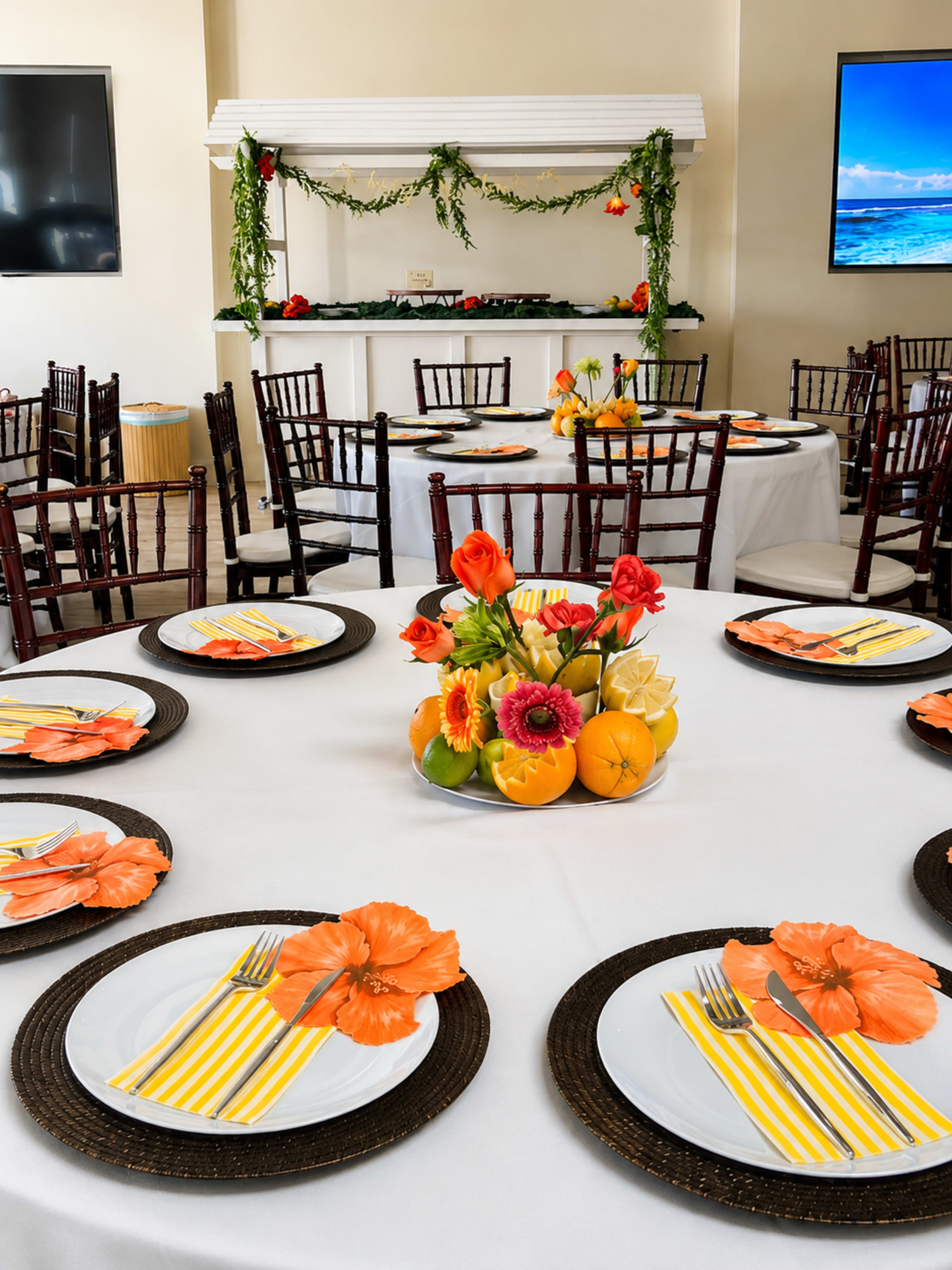 The image shows a dining setup with round tables adorned with white tablecloths, decorative plates, and vibrant floral centerpieces in a festive atmosphere.