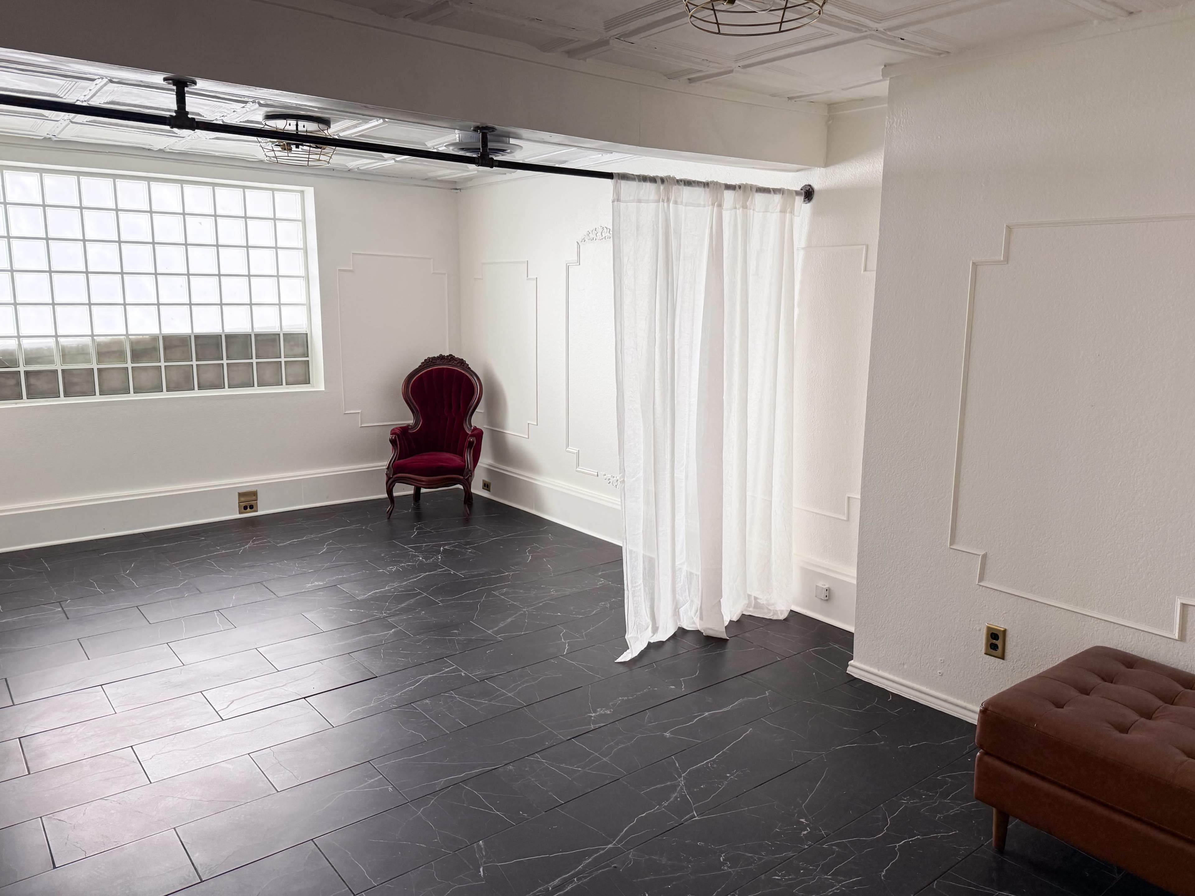 The Parisian Parlor at Archive Haus | a Natural Light all white European Style Studio Steps from the Denton Square Image in Denton, Denton, TX