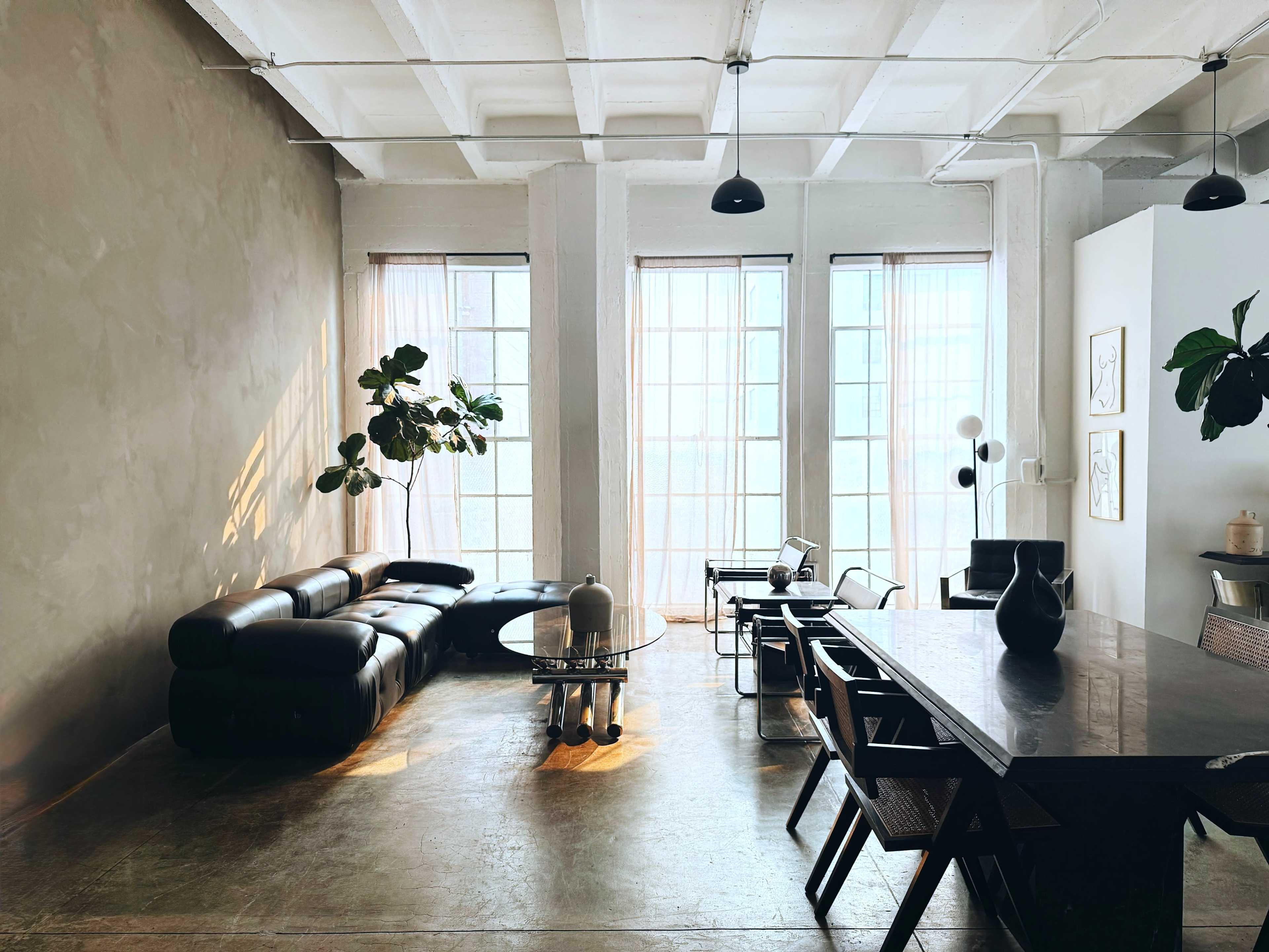 *Discounted Rate* Huge Corner Loft Studio with Limewash Concrete Wall, Cyc Wall, Designer Furniture, A/C and Lighting Eq Included Image in Central LA, Los Angeles, CA