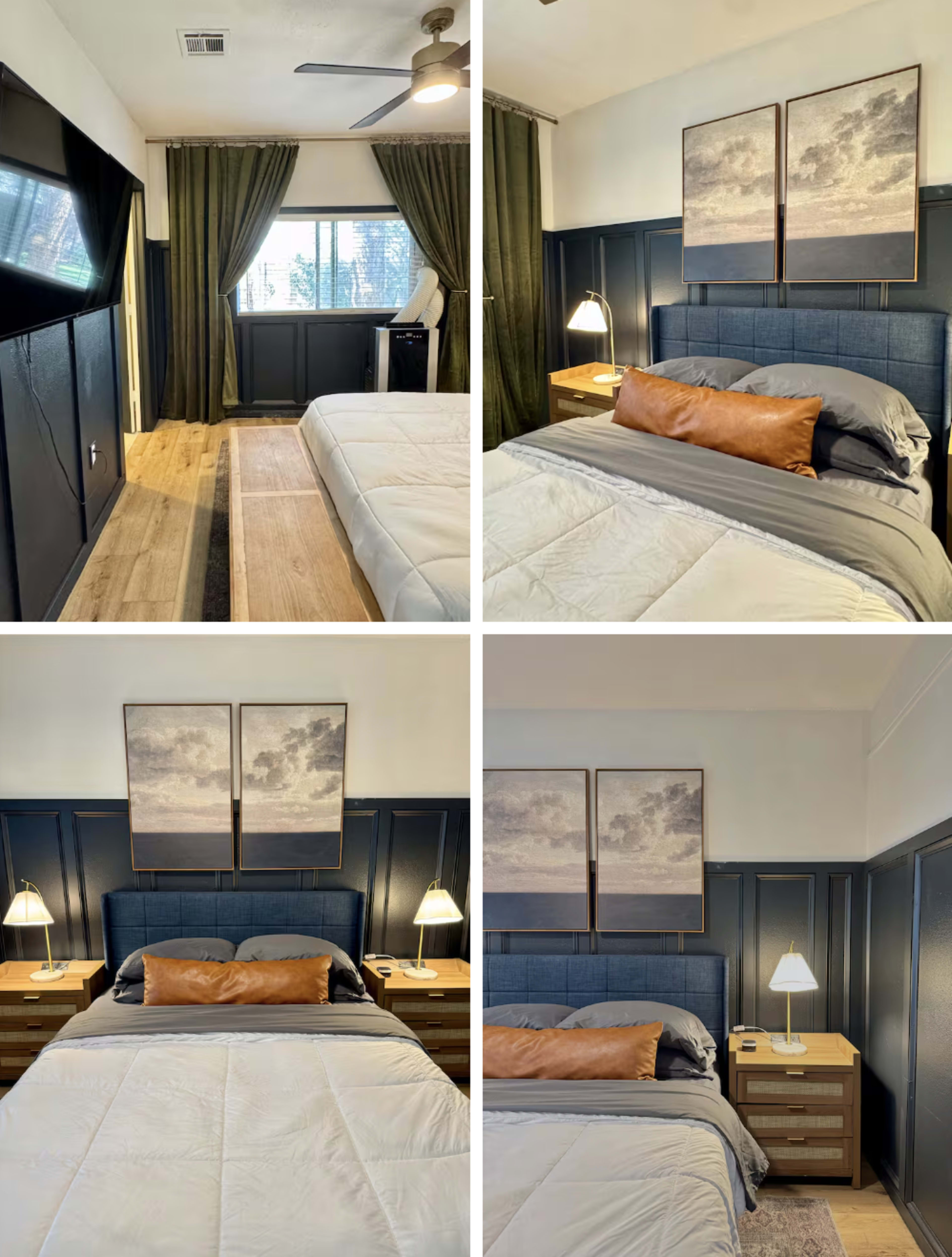 The image displays a modern bedroom featuring a navy blue headboard, a light gray bedspread, two abstract paintings above the bed, and large windows with green curtains.