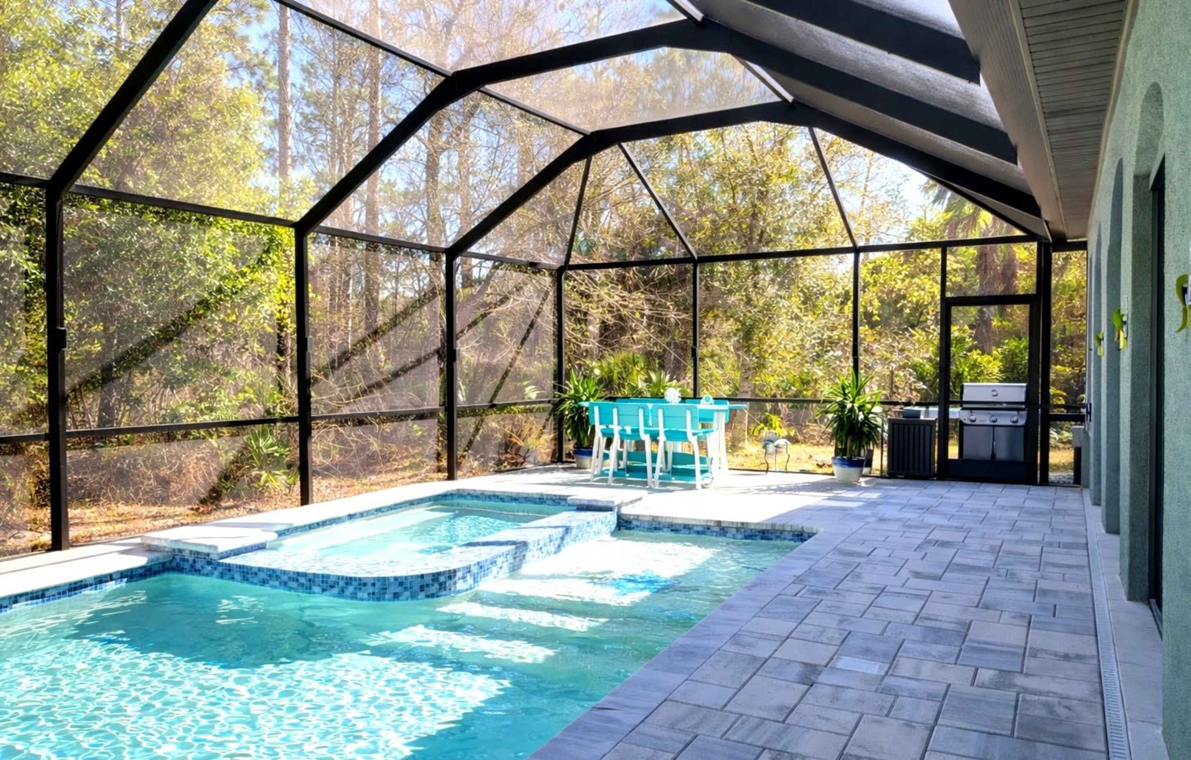 Private Screened Poolside Patio for Photos & Video Shoots Image in North Port, North Port, FL