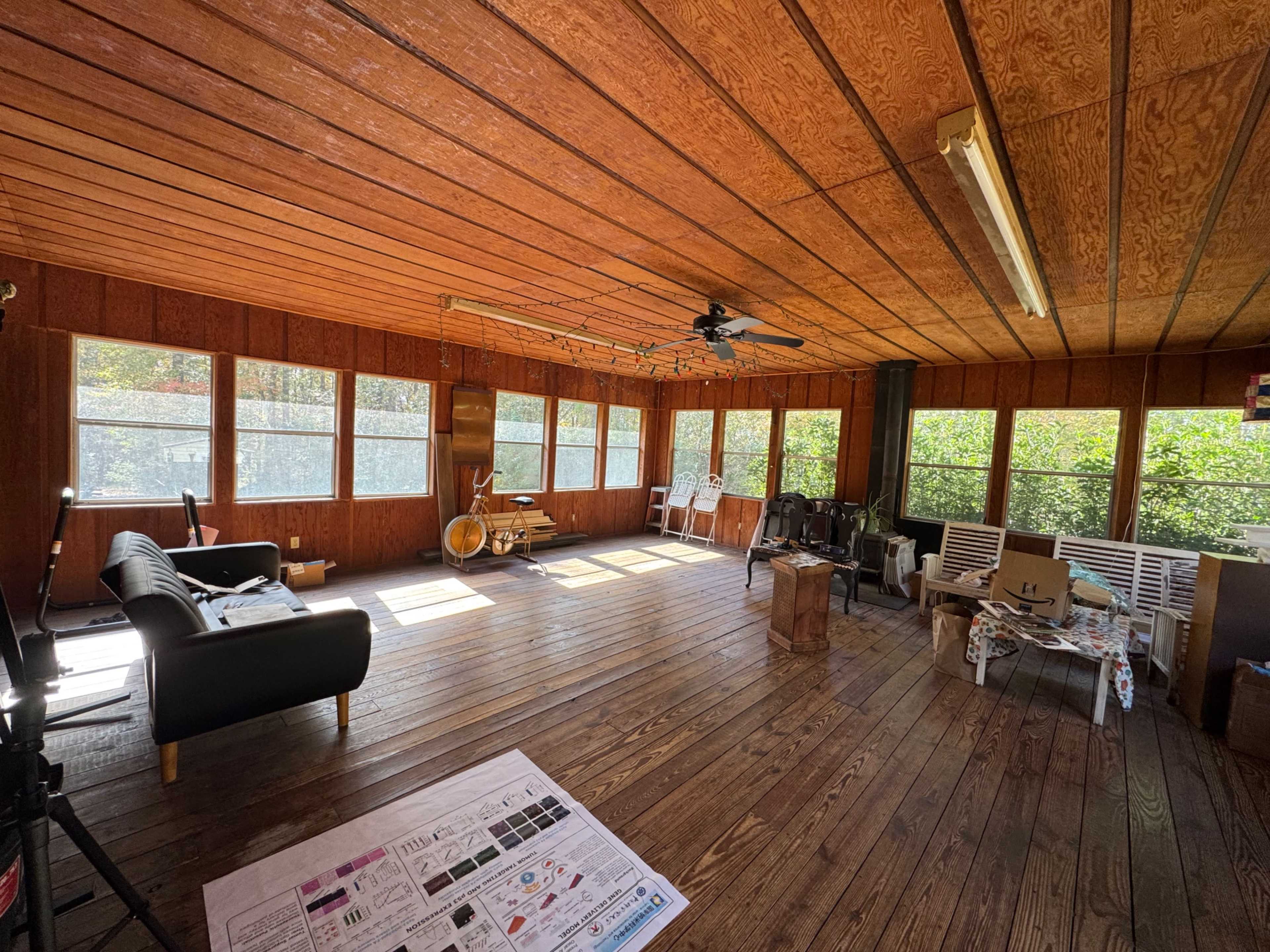 Cozy cabin type room with lots of natural light. Image in , Macon, GA